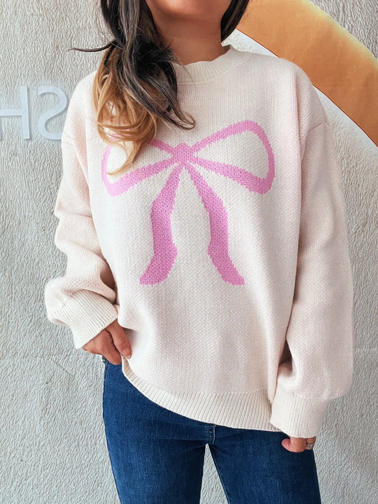 Stylish Bow Pattern Casual Long Sleeve Sweater for Effortless Everyday Wear, featuring a pink bow design, paired with denim jeans, perfect for a chic and comfortable look.