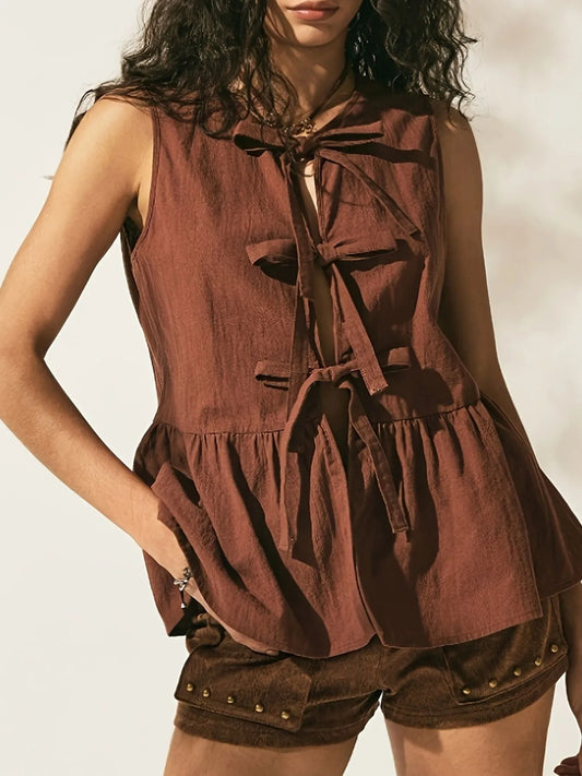 Trendsi Bow-Tie Peplum Tank Top with Ruched Detail, showcasing a stylish brown top with a bow-tie front and peplum silhouette, perfect for casual fashion lovers.