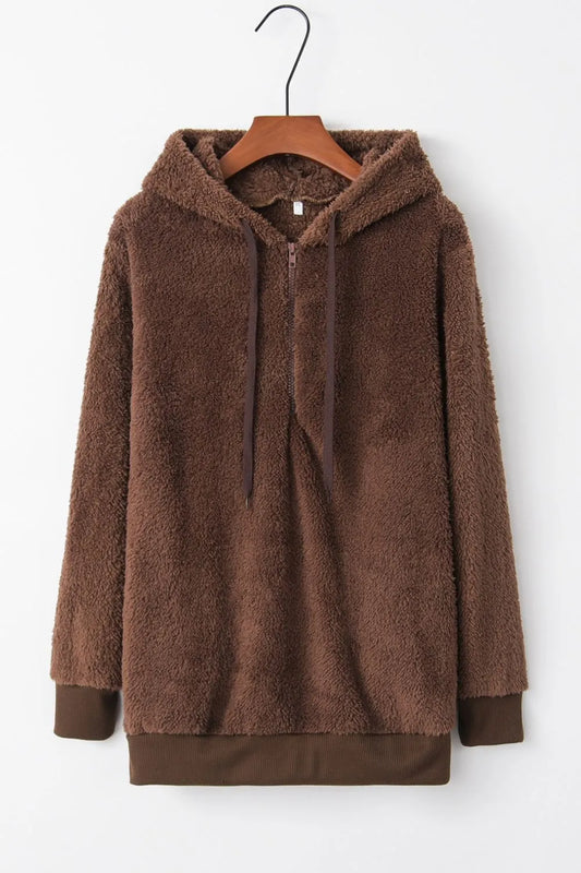 Cozy Full Size Teddy Hoodie with Quarter-Zip and Drawstring, Opaque & Slightly Stretchy, 100% Polyester, displayed on a hanger showcasing its soft, fluffy texture and design.