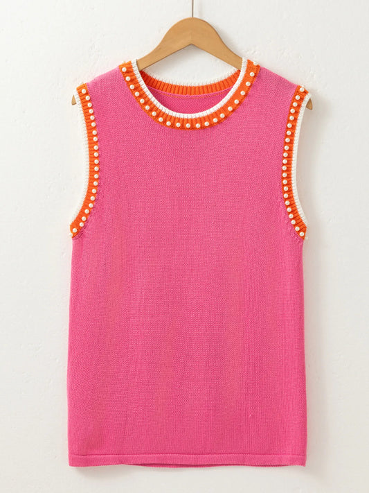 Stylish Contrast Trim Pearl Detail Sweater Tank Top displayed on a hanger, highlighting its chic design with pink fabric, pearl embellishments, and contrasting orange trim, perfect for fashionable layering.