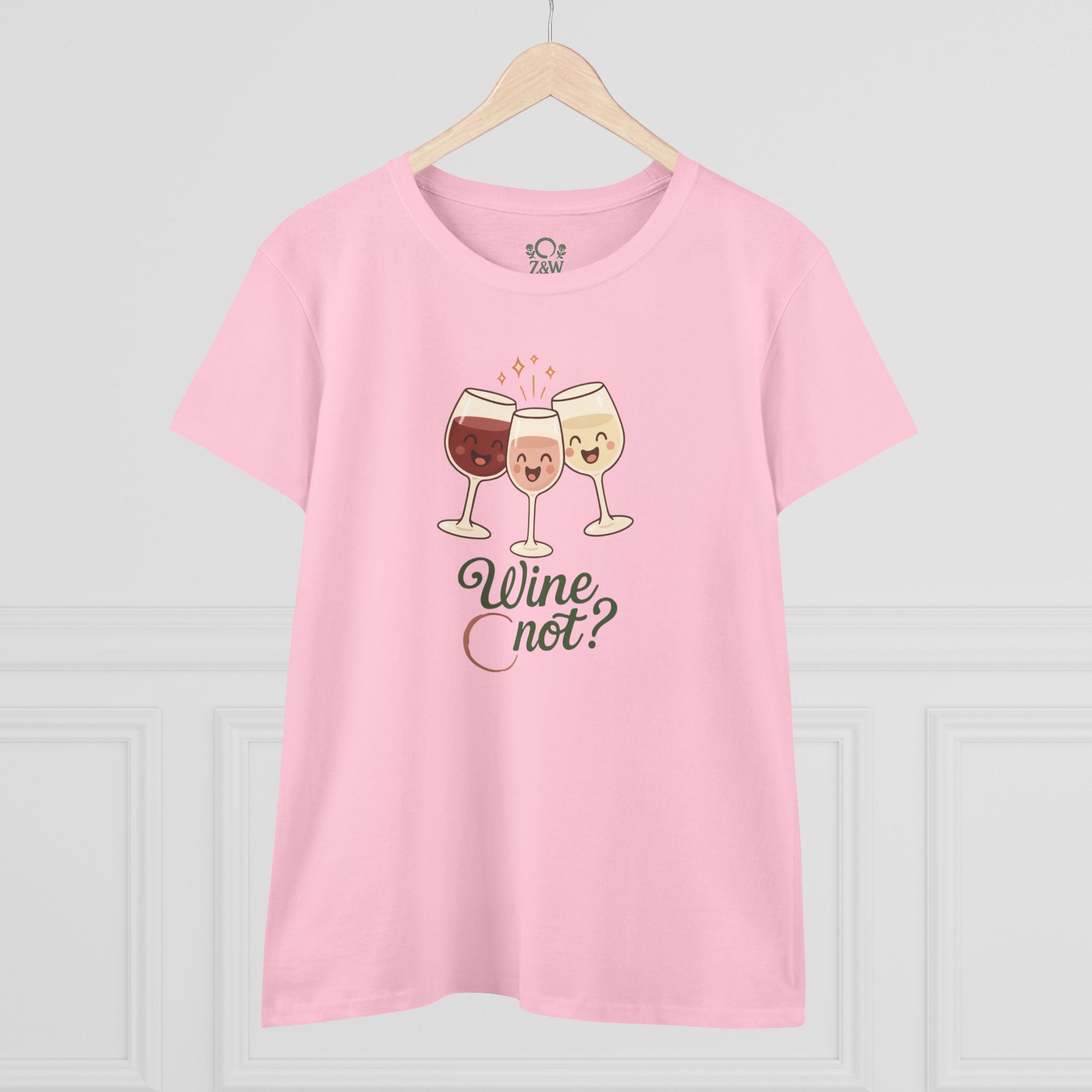 Front view of the Wine Not Tee in pink with a playful design featuring wine glasses and the text 'Wine Not?', showcasing its fun and stylish appeal.
