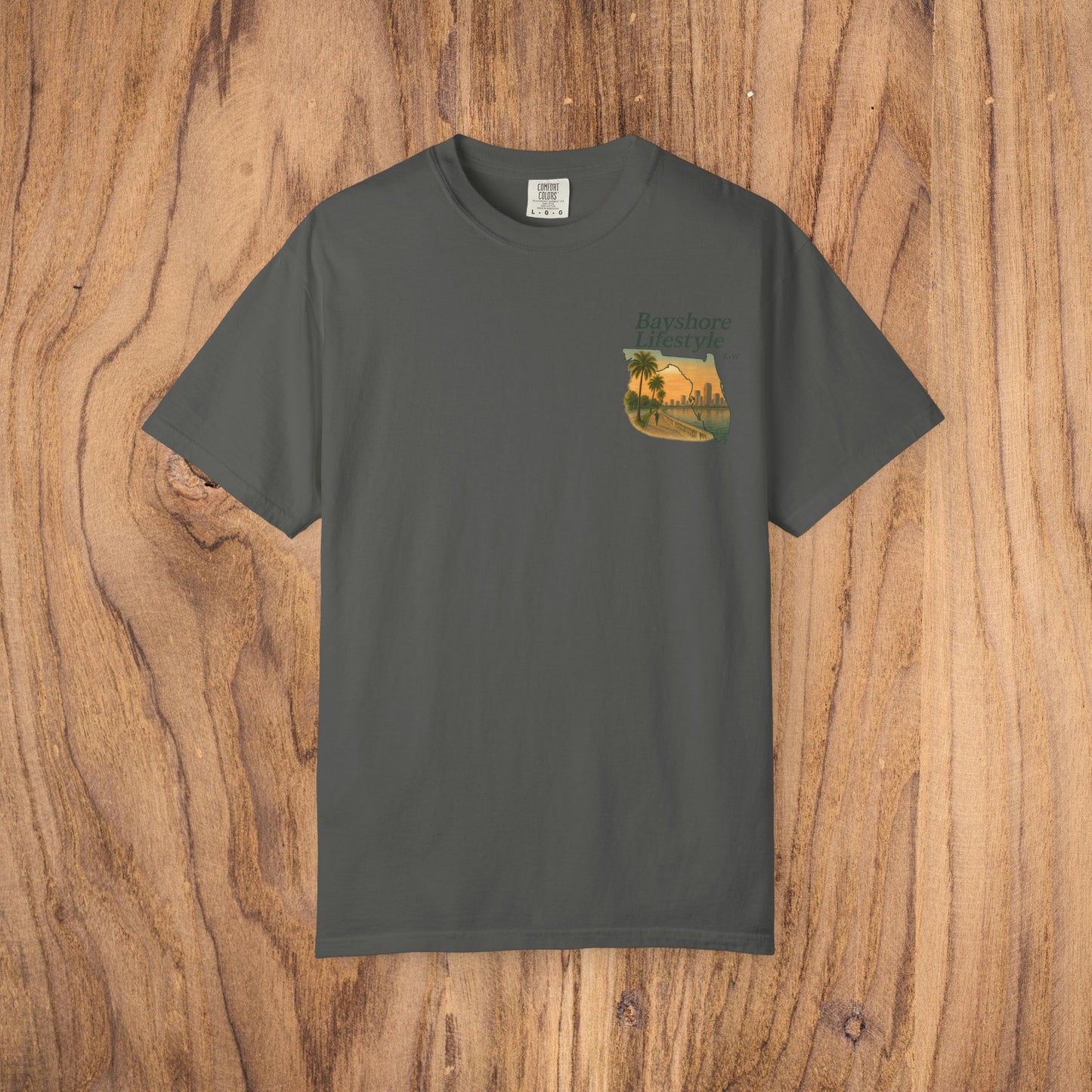 Bayshore Lifestyle Tee in dark gray color, featuring a stylish palm tree design on a lightweight 100% cotton fabric, suitable for all seasons.