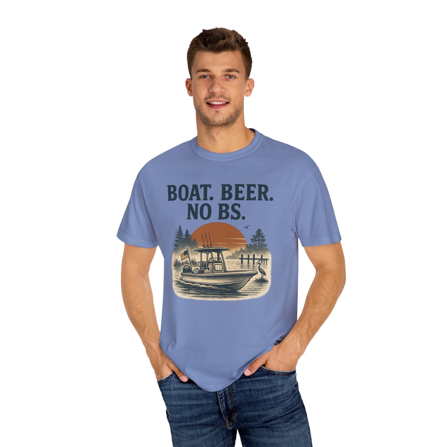 Boat Beer No BS Tee worn by a man in a light blue shade, featuring a boat graphic against a sunset backdrop, a must-have for outdoor enthusiasts.