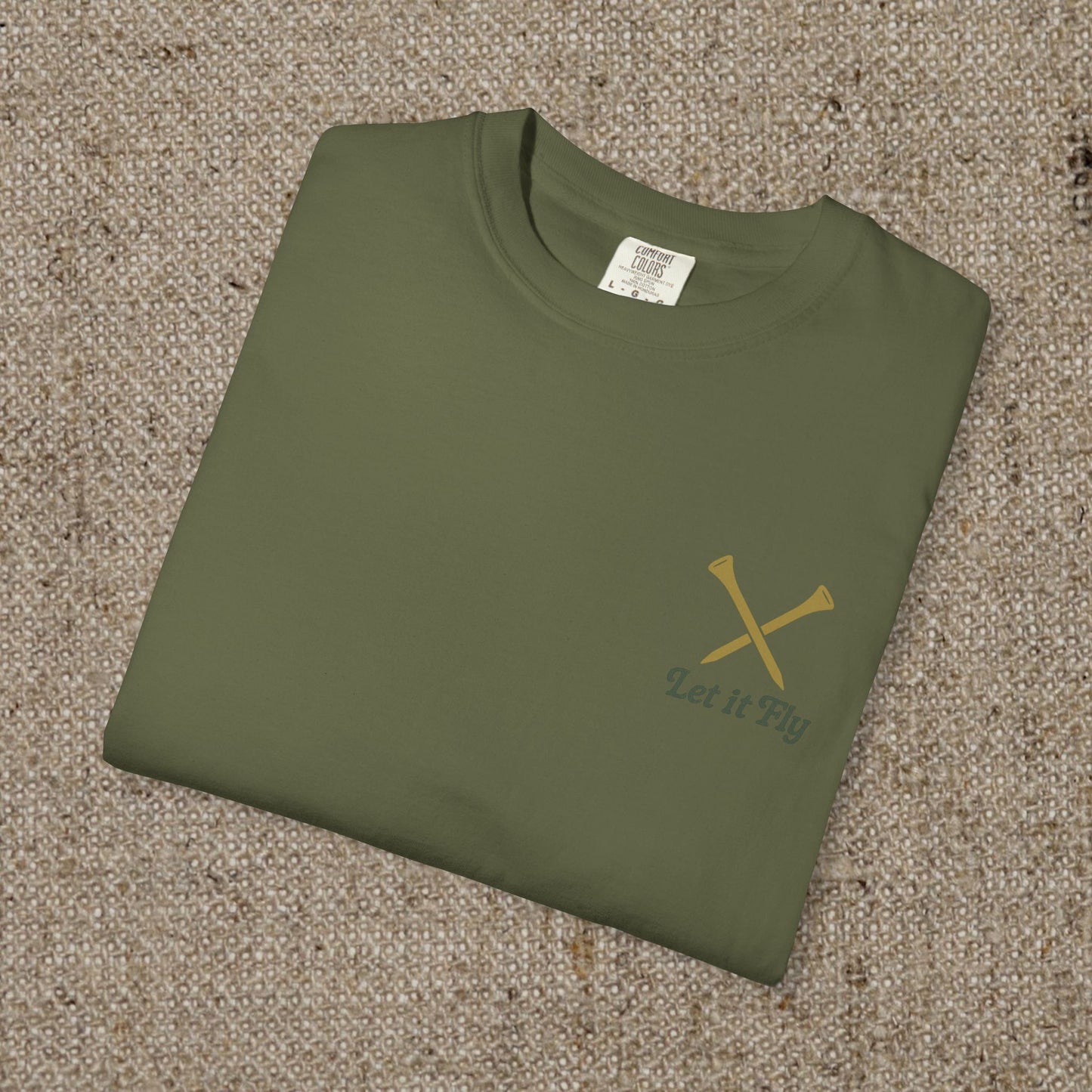 Folded Tee It High Let It Fly Graphic Tee in olive green with stylish golden crossed golf clubs, ideal for casual wear.