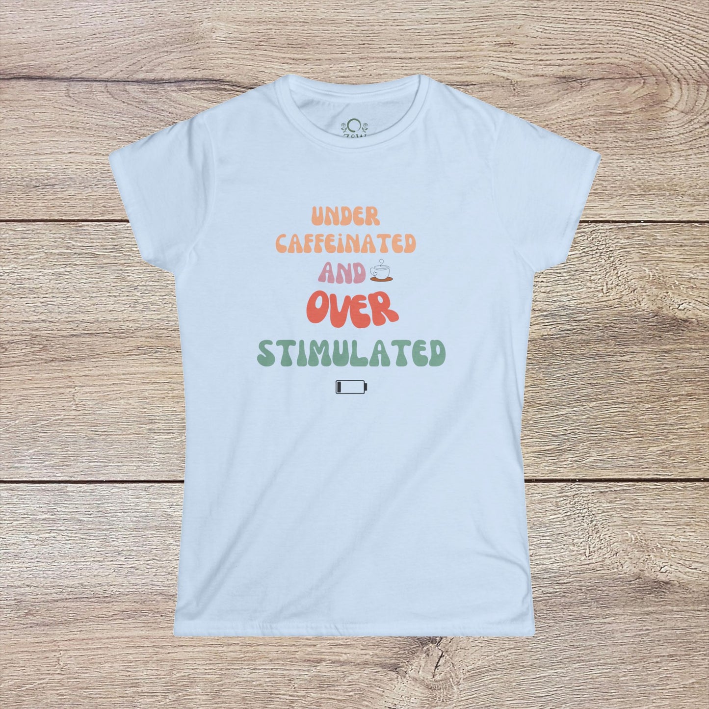 Under-Caffeinated Over-Stimulated Hoodie in soft white color with engaging text, showcasing a roomy kangaroo pouch and adjustable hood.
