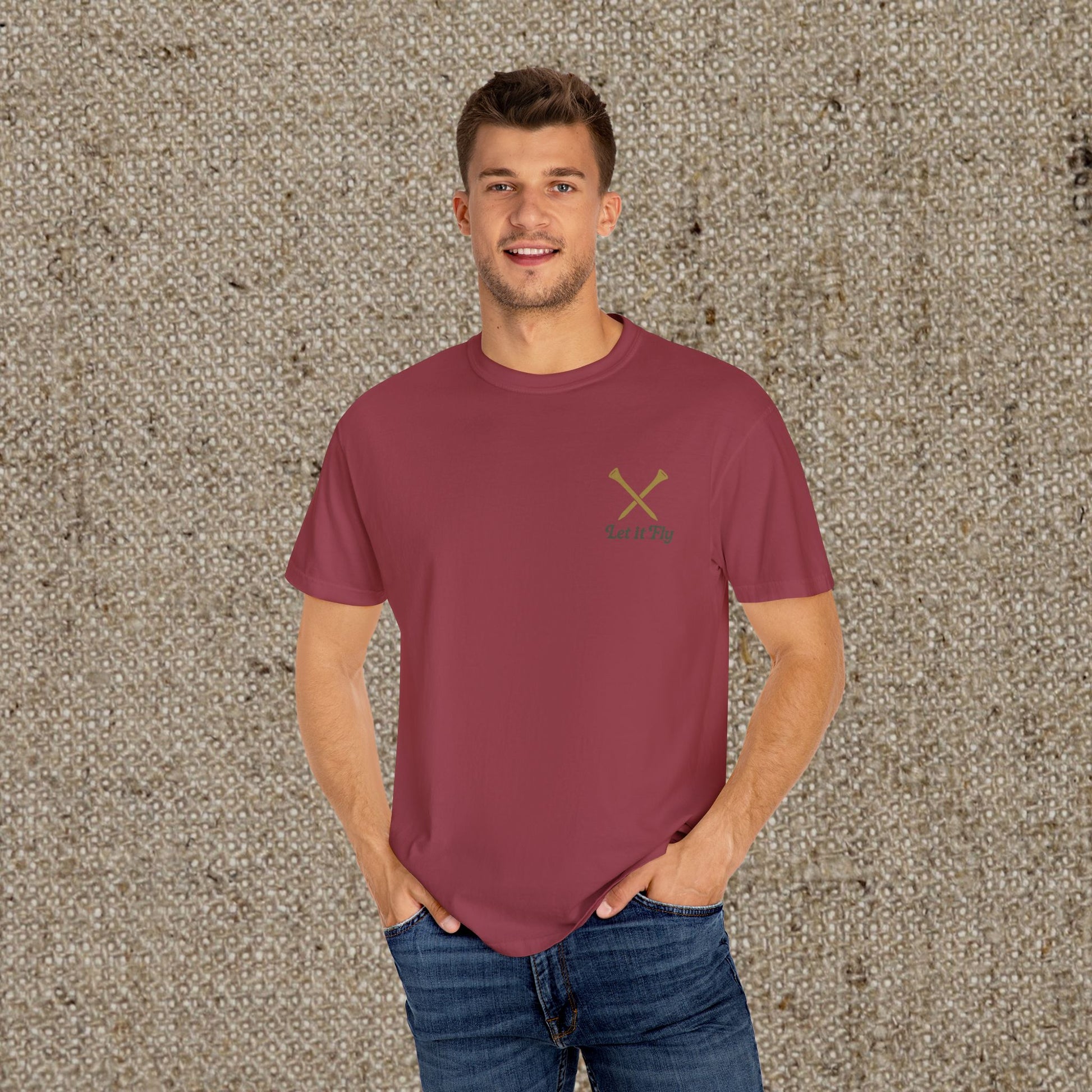 Stylish Tee It High Let It Fly Graphic Tee displayed on a man, featuring a minimalistic design in a rich maroon color, perfect for casual outings.