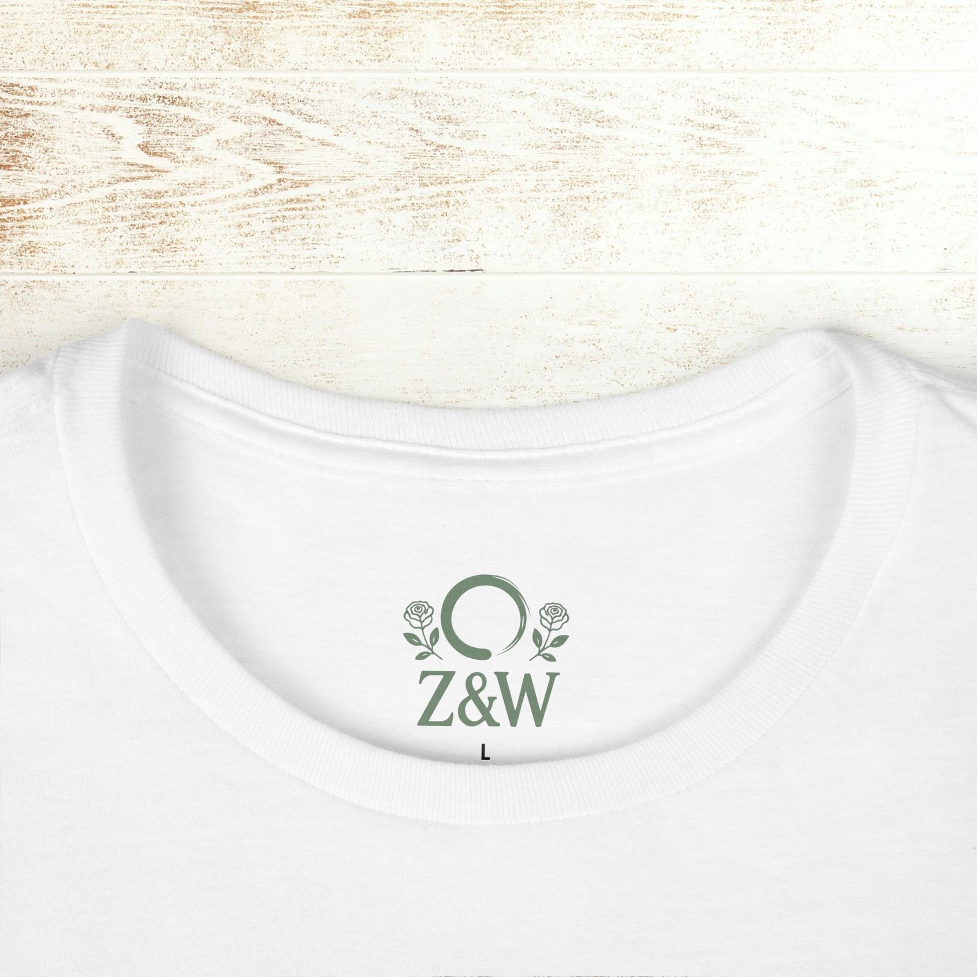No Bad Vibes Tee - Close-up of the neckline on a white t-shirt featuring a ribbed collar and brand logo, showcasing its sustainable fabric.