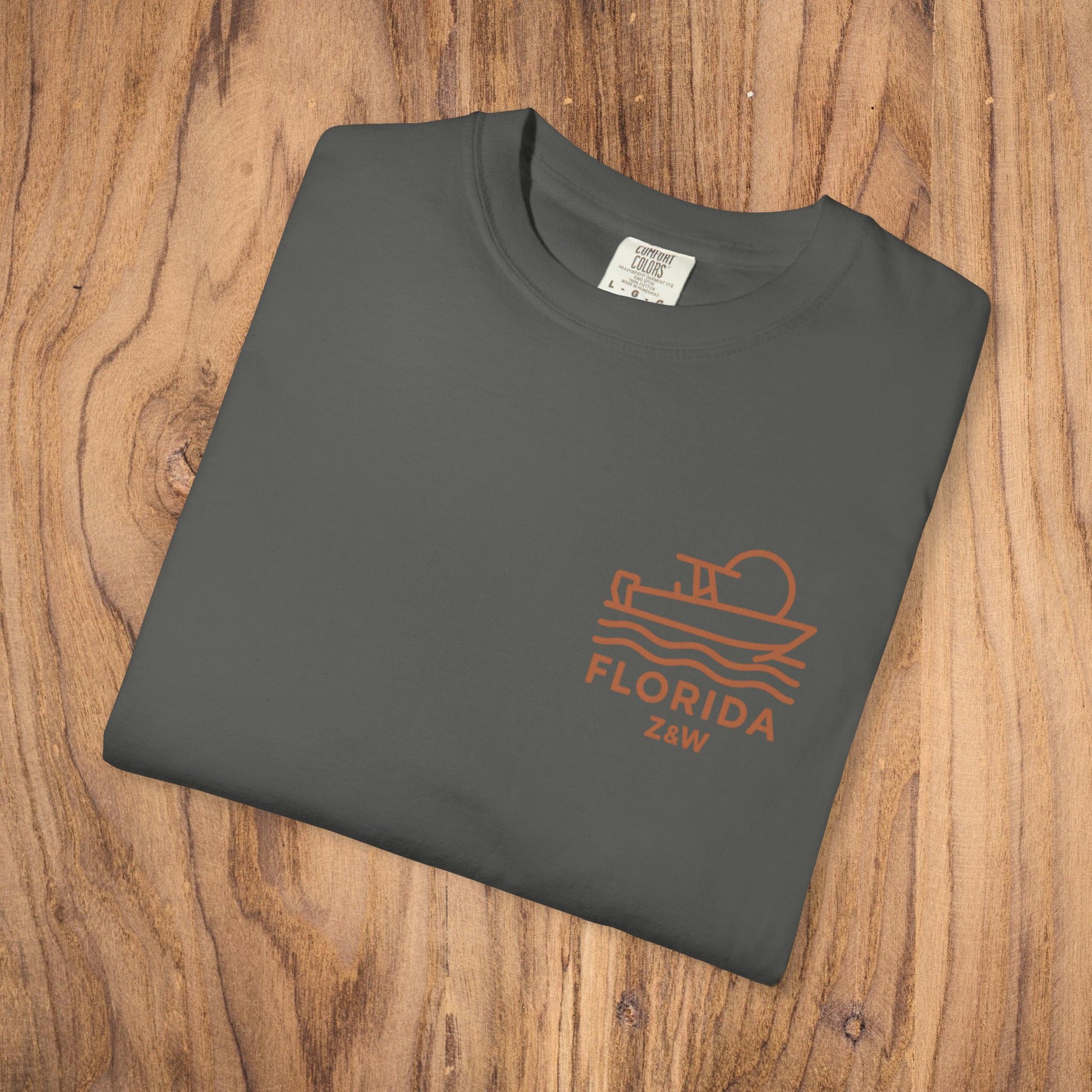 Unisex Florida Graphic Tee displayed flat in a stylish gray color, featuring a minimalist boat graphic, perfect for casual attire.