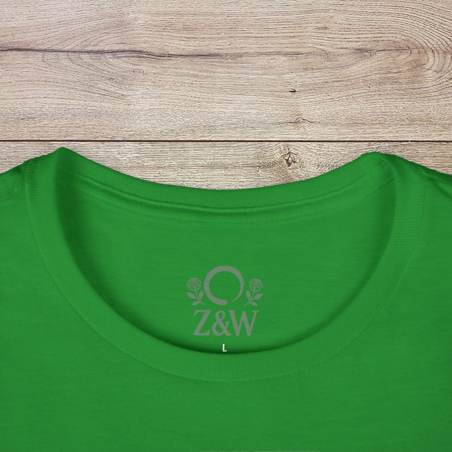 Close-up of the collar area of a Funny Pilates T-Shirt in vibrant green, featuring the Z&W logo and elastic ribbed design for classic fit.