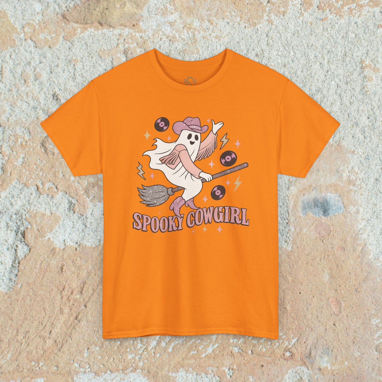 Spooky Cowgirl Graphic Tee in vibrant orange, highlighting a cheerful ghost with a cowboy hat, making it a fun choice for Halloween and casual wear.