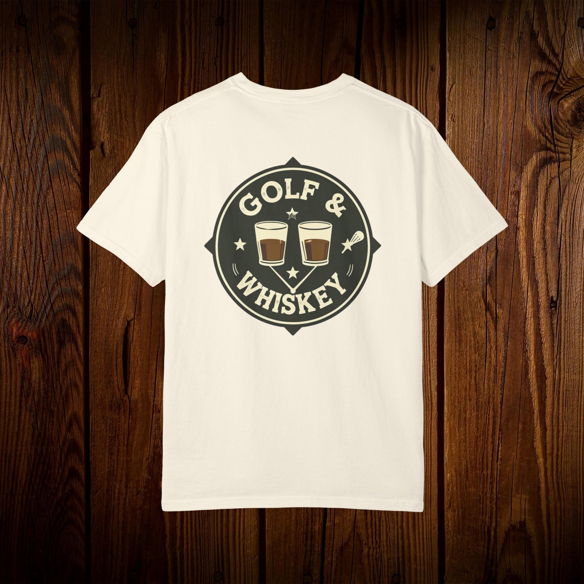 Men's Golf & Whiskey Tee featuring a stylish back design with golf and whiskey graphics on a wooden background, showcasing its eco-friendly design and soft cotton material.