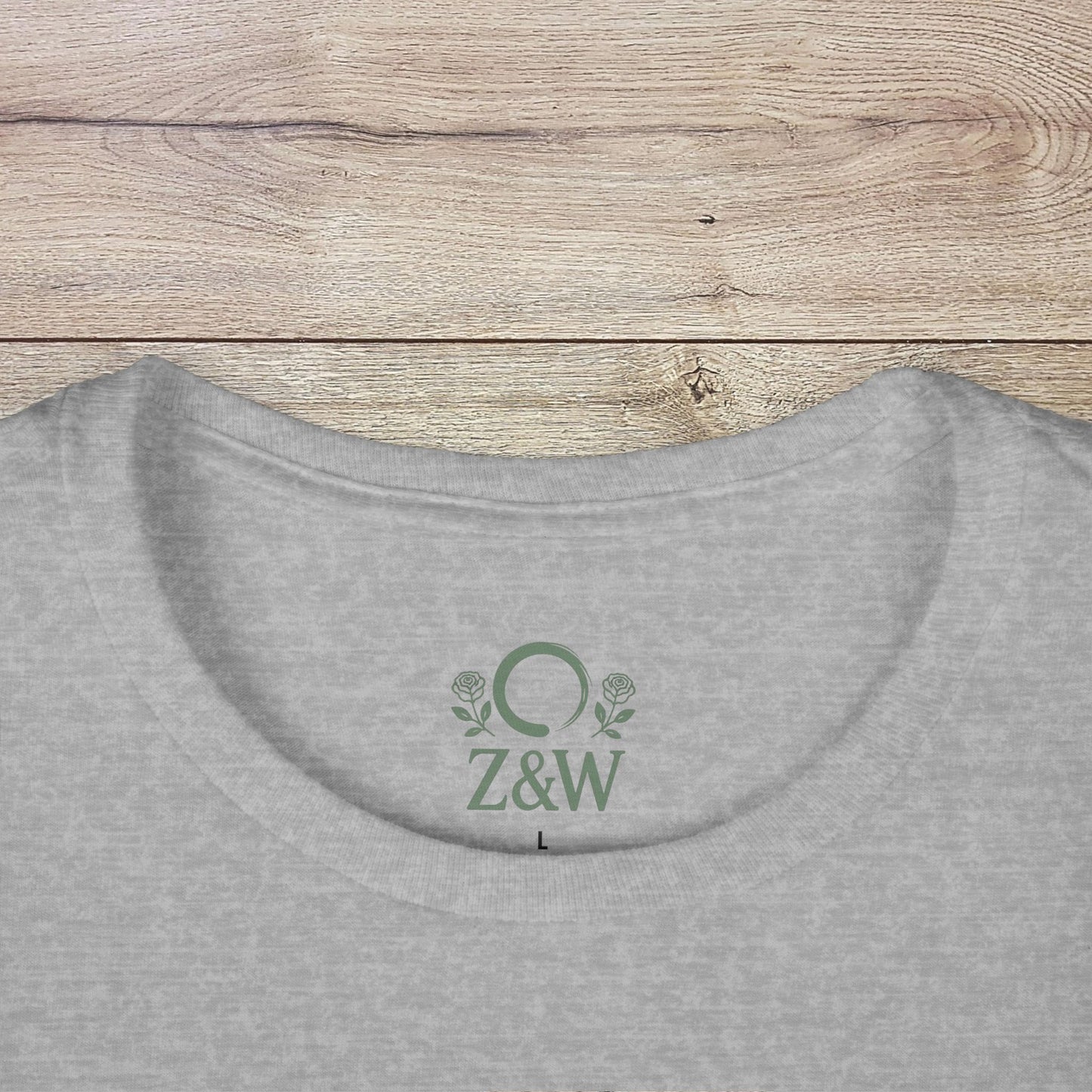 Close-up of the back neckline of a grey Funny Pilates T-Shirt, highlighting durable shoulder tape for added stability and comfort.