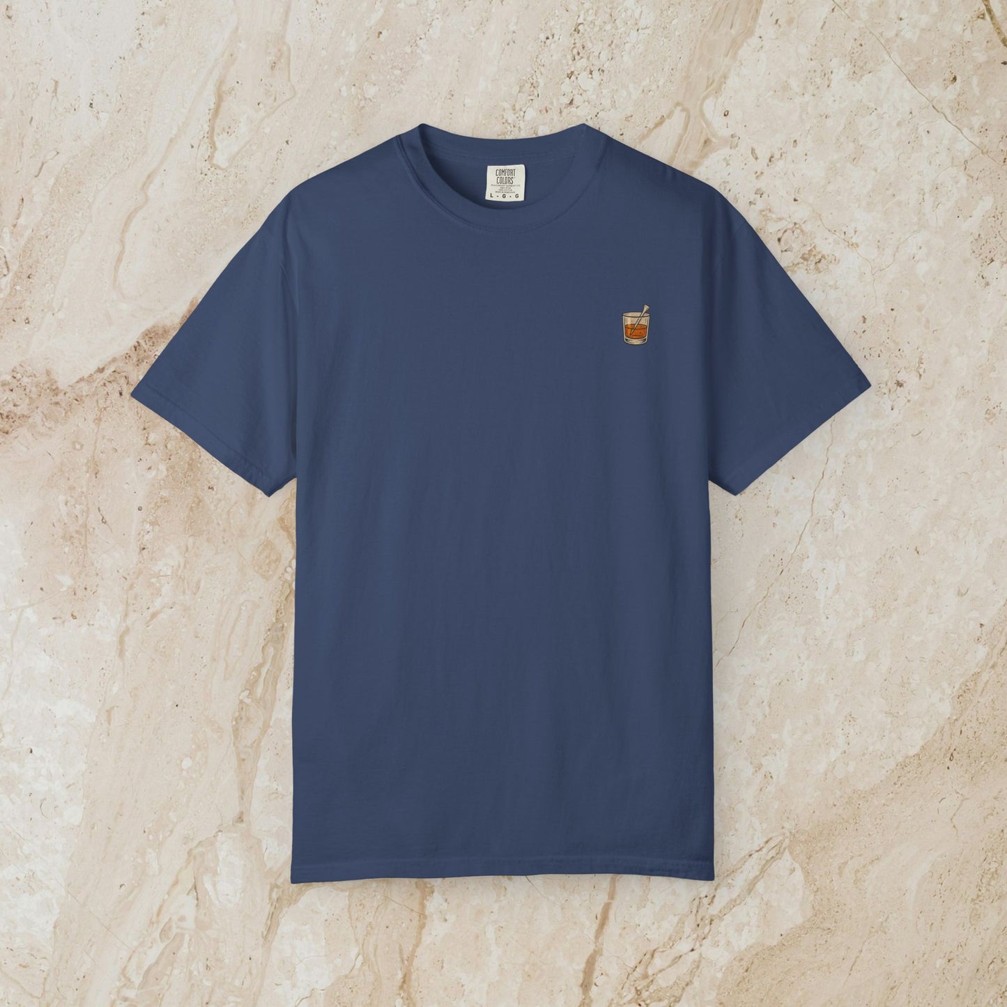 Golden Whiskey Dog Tee in navy blue color, showcasing a unique vintage style, designed with 100% cotton for a relaxed fit and a left chest pocket.