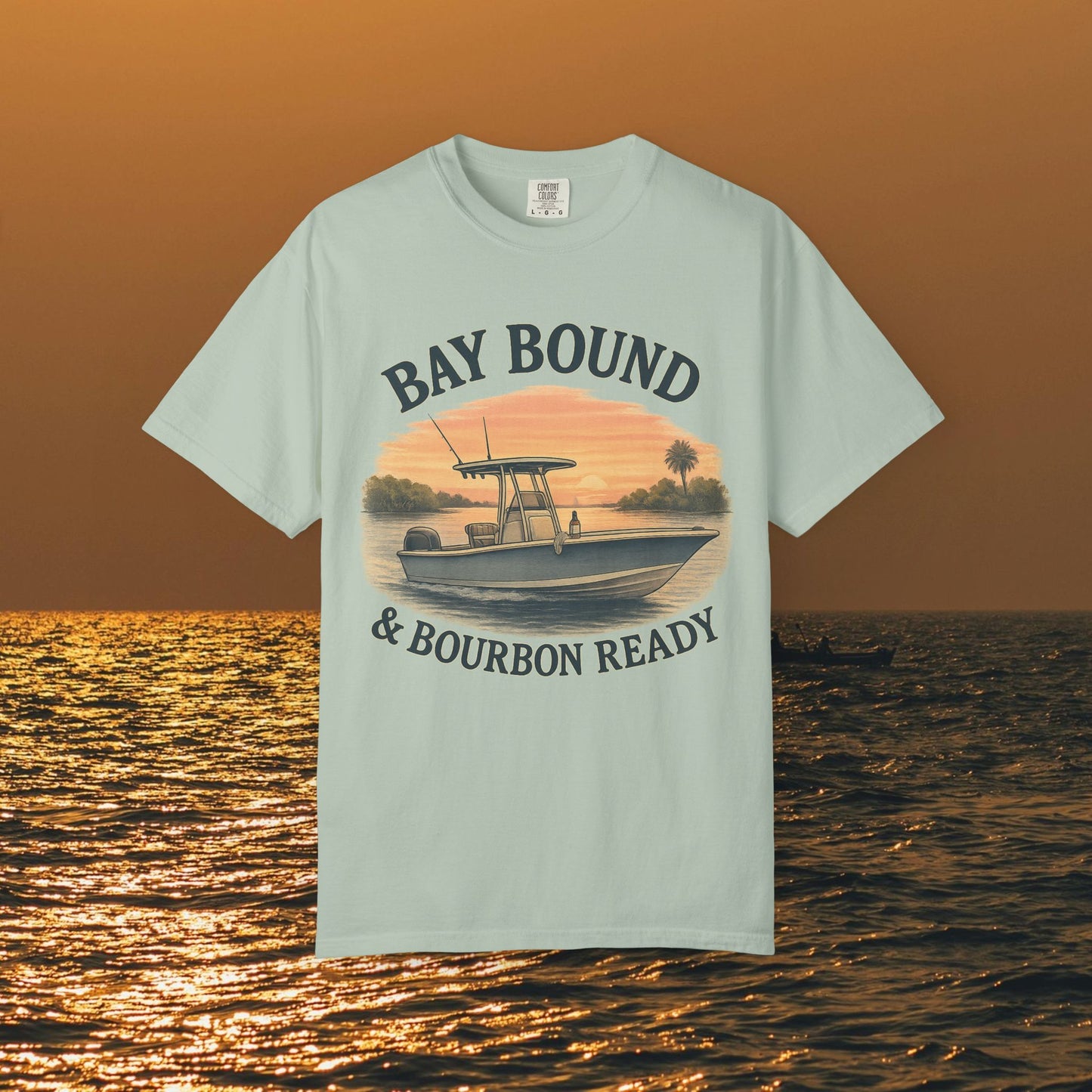 Bay Bound T-Shirt for Summer featuring a boat graphic against a sunset backdrop, perfect casual tee for fishing and beach lovers.