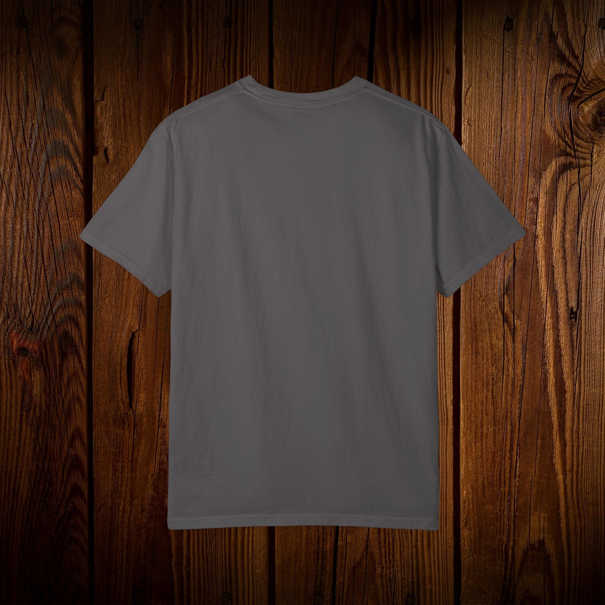 Back view of the Unisex Swamp-Bred Fairway-Fed Tee in a neutral color, highlighting its simple and versatile style.