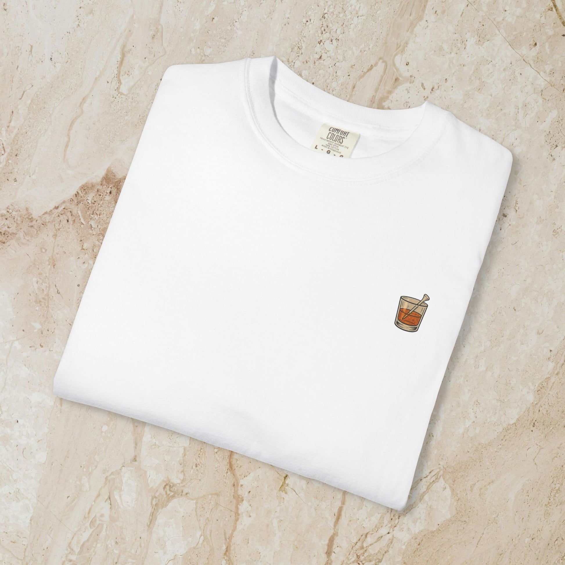 Golden Whiskey Dog Tee in classic white, highlighting a delicate left chest pocket and soft cotton feel, perfect for a relaxed style and showcasing a vintage look.