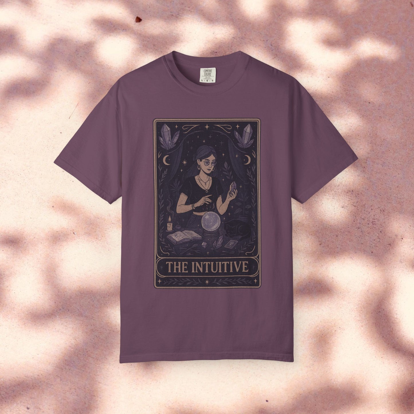 The Intuitive Tarot Tee in a rich purple color, constructed from 100% cotton with an eye-catching tarot illustration, offered in sizes S-4XL for personalized style.