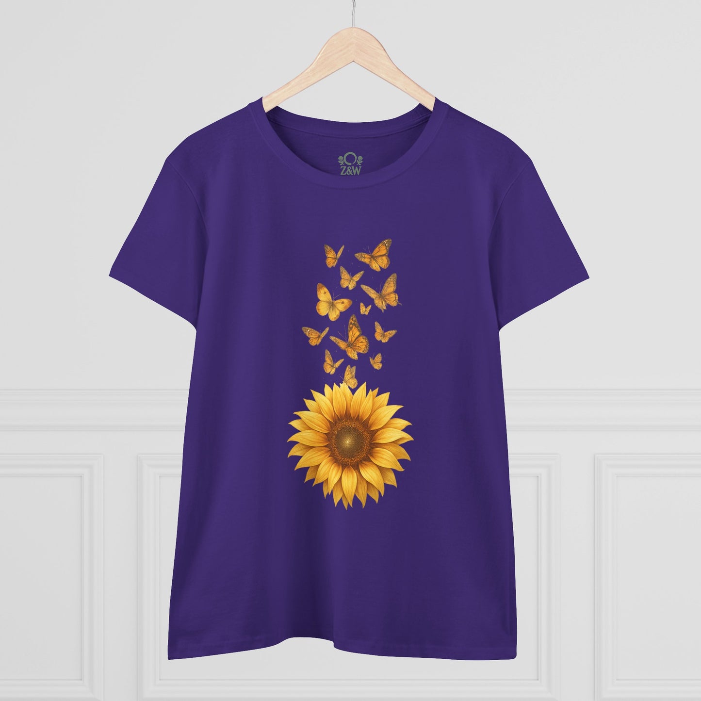Sunflower & Butterflies Cotton Tee for Women - 100% Soft Cotton, Breathable, Durable Design, presenting a vibrant sunflower and butterflies design on a purple backdrop.