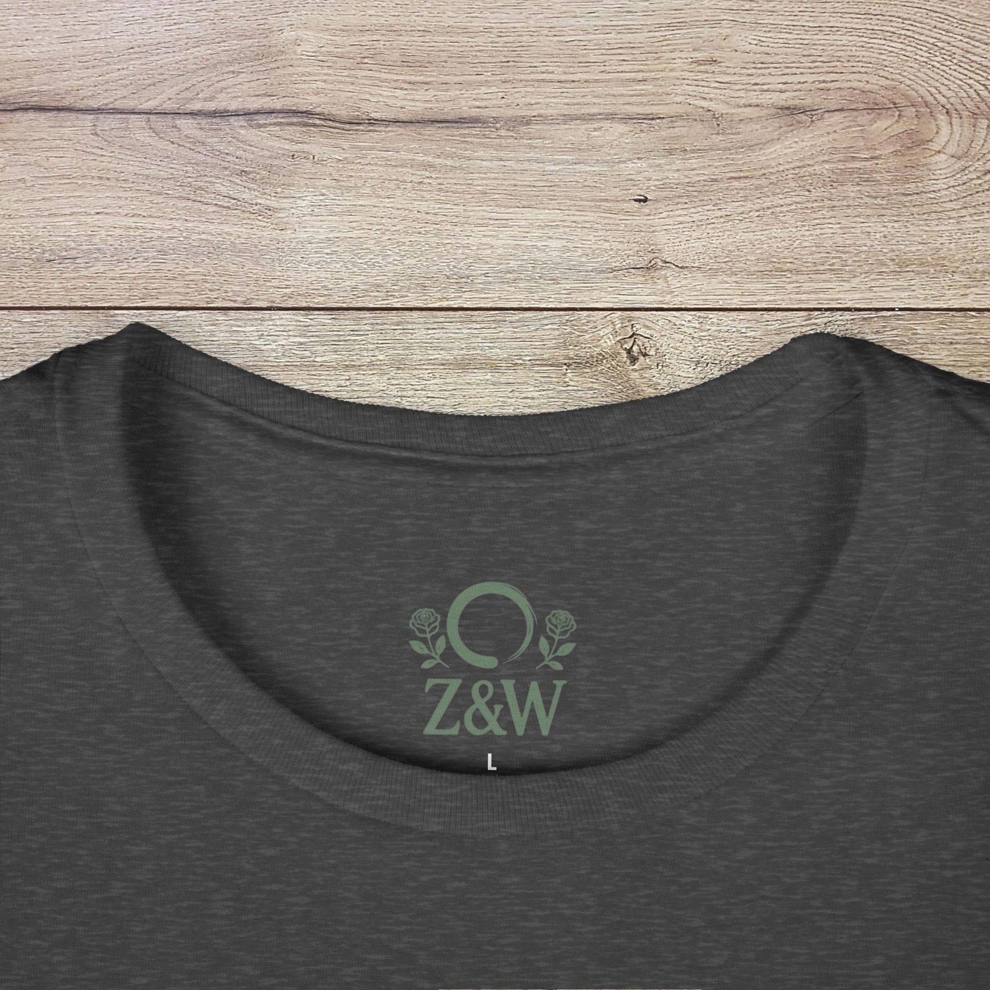 Close-up of the collar area of a Funny Pilates T-Shirt in dark gray, displaying the Z&W logo and smooth fabric ideal for printing.
