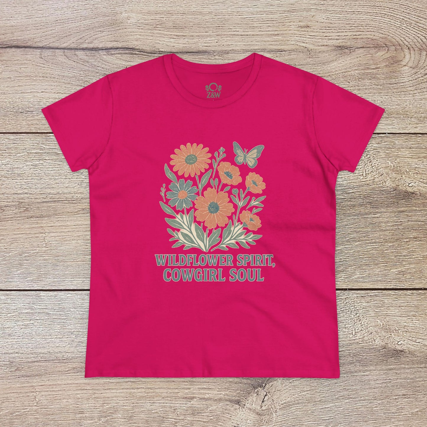 Wildflower Spirit Cotton Tee in vibrant pink, adorned with a floral motif and the phrase 'WILDFLOWER SPIRIT, COWGIRL SOUL' - ideal for showcasing your style.