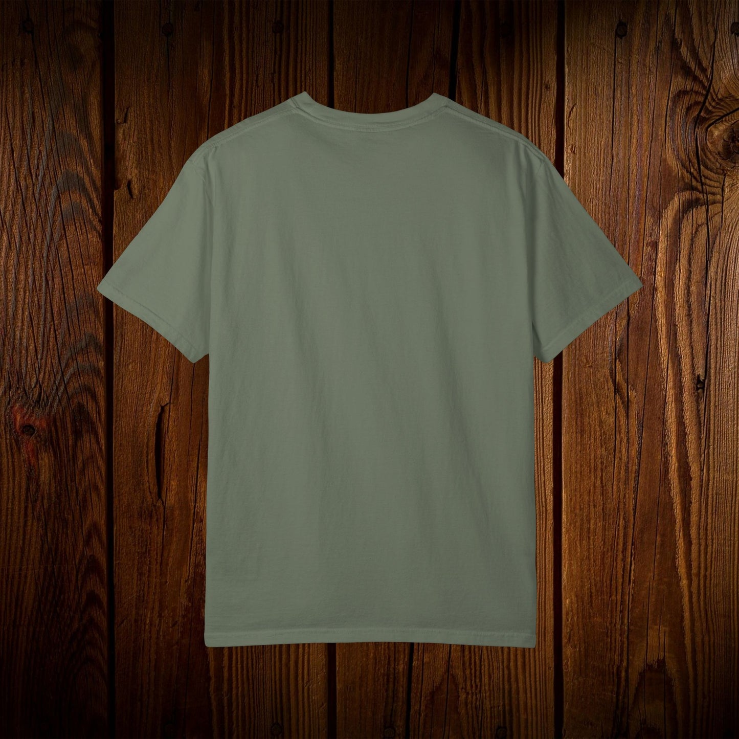 Back view of the Unisex Swamp-Bred Fairway-Fed Tee in a soothing green color, highlighting the classic, clean design suitable for any casual occasion.
