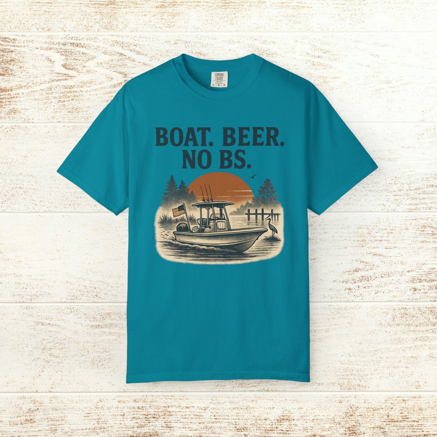 Boat Beer No BS Tee in vibrant teal featuring a scenic boat graphic with a sunset, perfect for boating fans and casual wear.