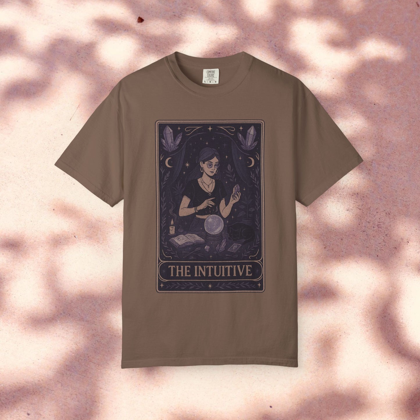 Intuitive Tarot Tee in earthy brown, adorned with an illustration of a tarot reader, made from durable premium 100% cotton for lasting wear.