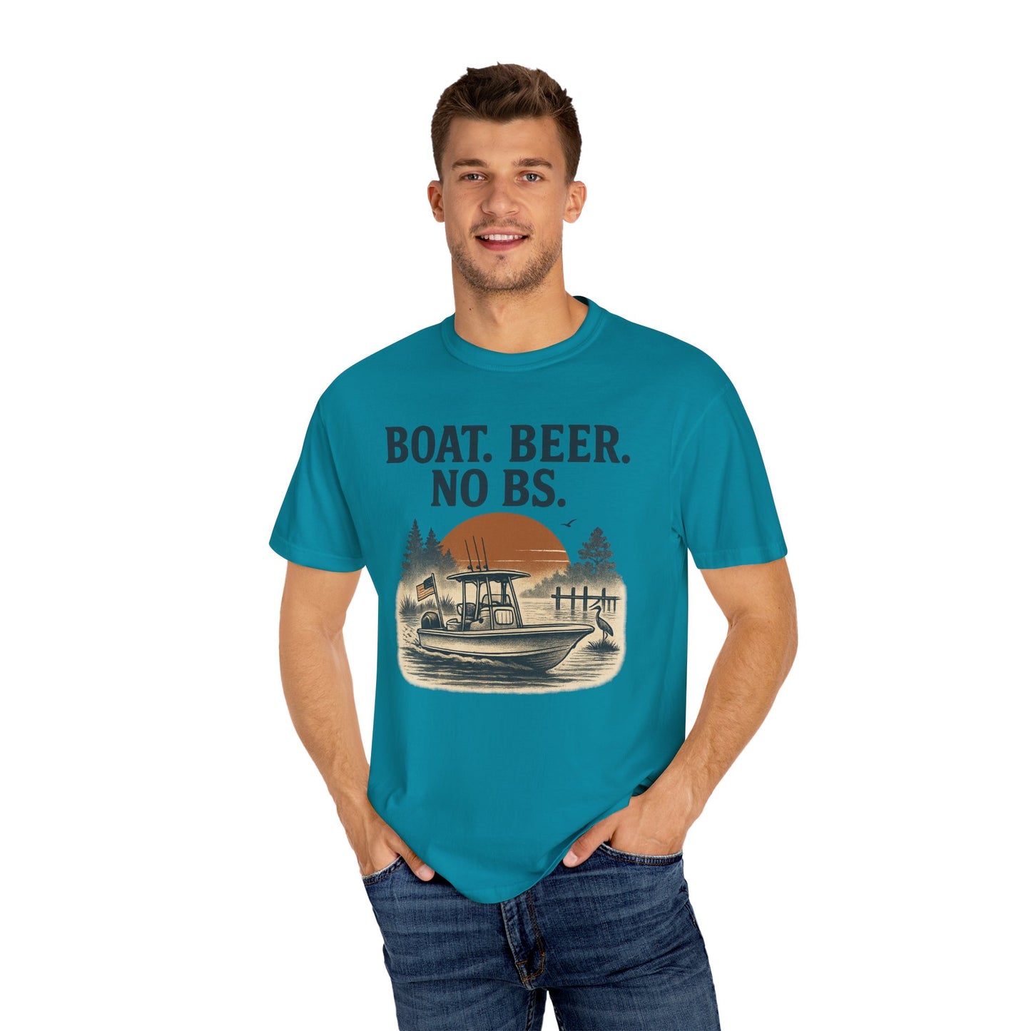 Boat Beer No BS Tee worn by a man, featuring a vibrant teal color and a graphic print of a boat and sunset, perfect for casual outings and summer adventures.