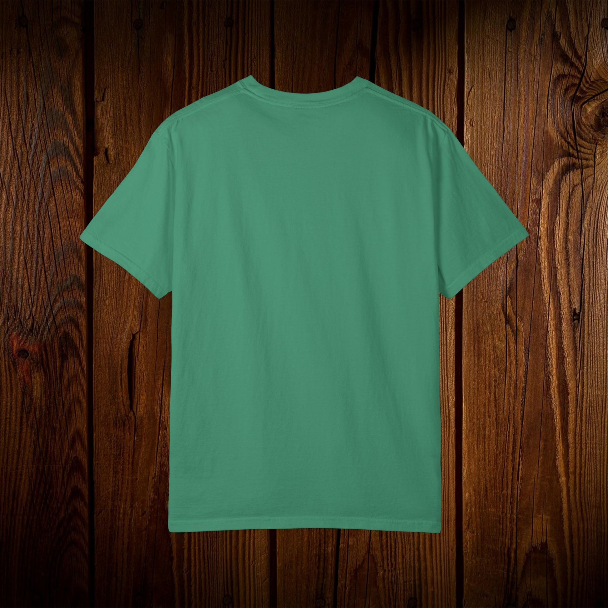 Back view of the Unisex Swamp-Bred Fairway-Fed Tee in a vibrant teal color, highlighting its seamless design and high-quality fabric. Perfect for a casual, comfortable look for all golf lovers.