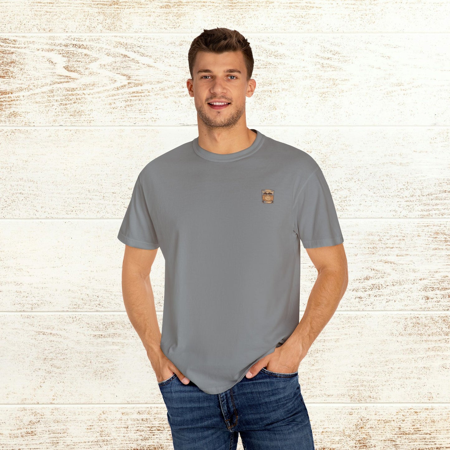 Rodeo On The Rocks Tee - Soft 100% US Cotton featuring a man wearing a gray t-shirt, highlighting its comfort and unique garment-dyed style.