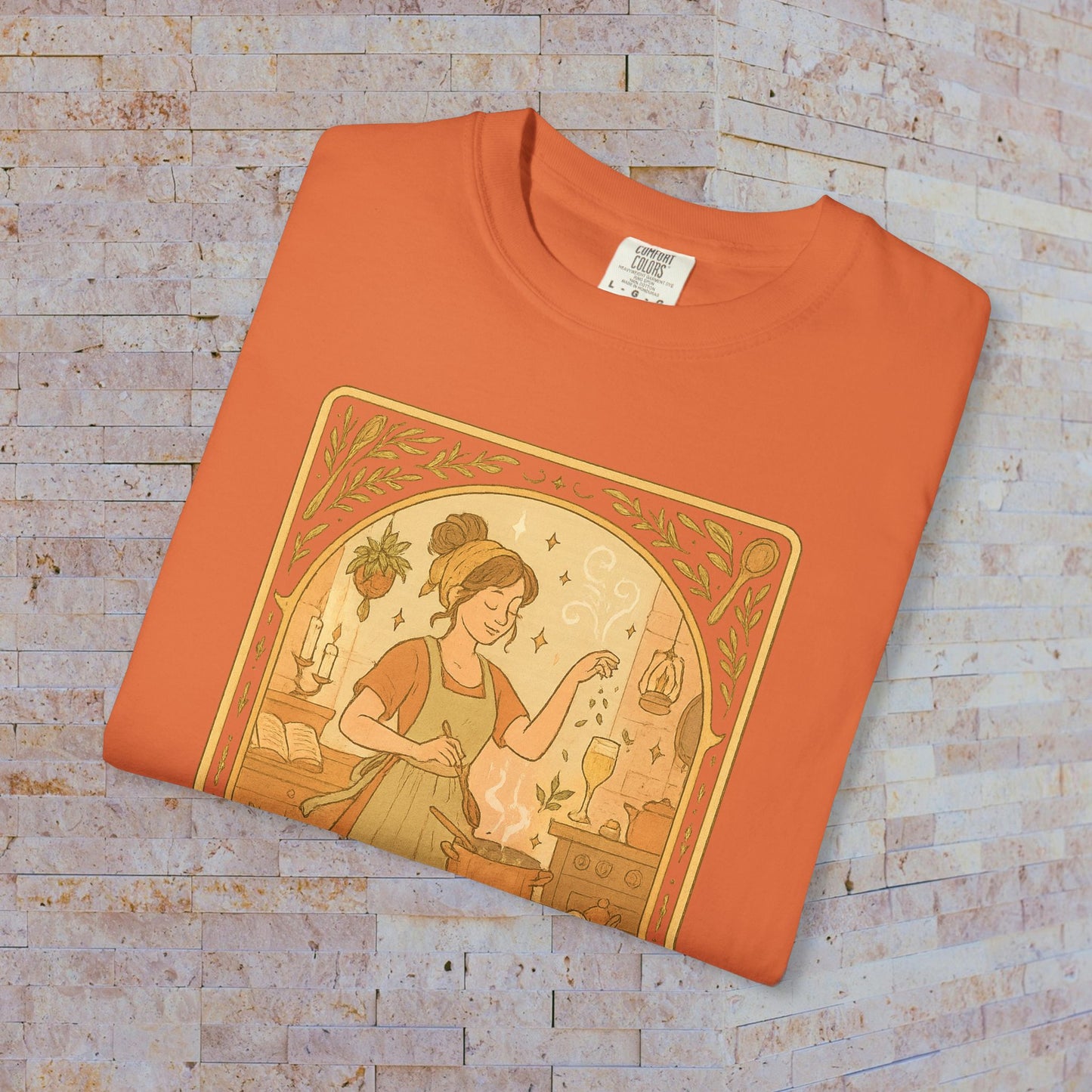 Culinary Queen Tarot Tee in vibrant orange, highlighting a unique illustration of a woman with cooking accoutrements, available in sizes S to 4XL, made from soft pre-shrunk cotton.