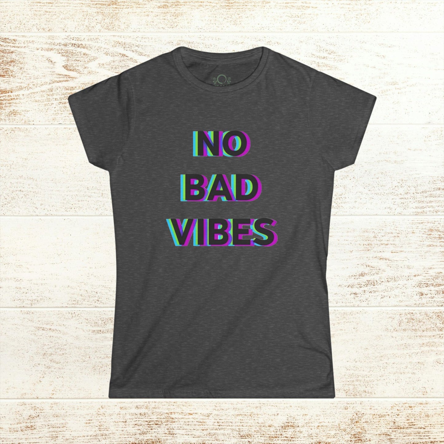 No Bad Vibes Tee in dark heather color, designed without side seams for a sleek look and made from sustainable, ethically produced materials.