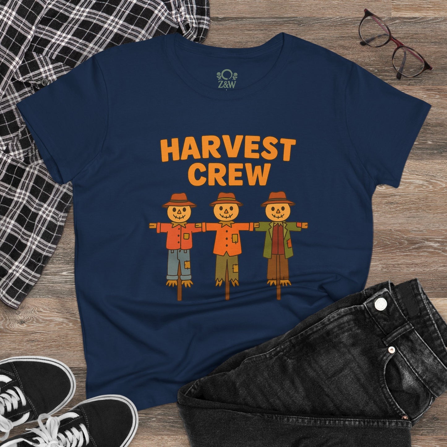 Casual navy Harvest Crew Halloween T-Shirt featuring fun scarecrow graphics, designed for comfort with soft 100% ring-spun cotton material, ideal for all-day wear.