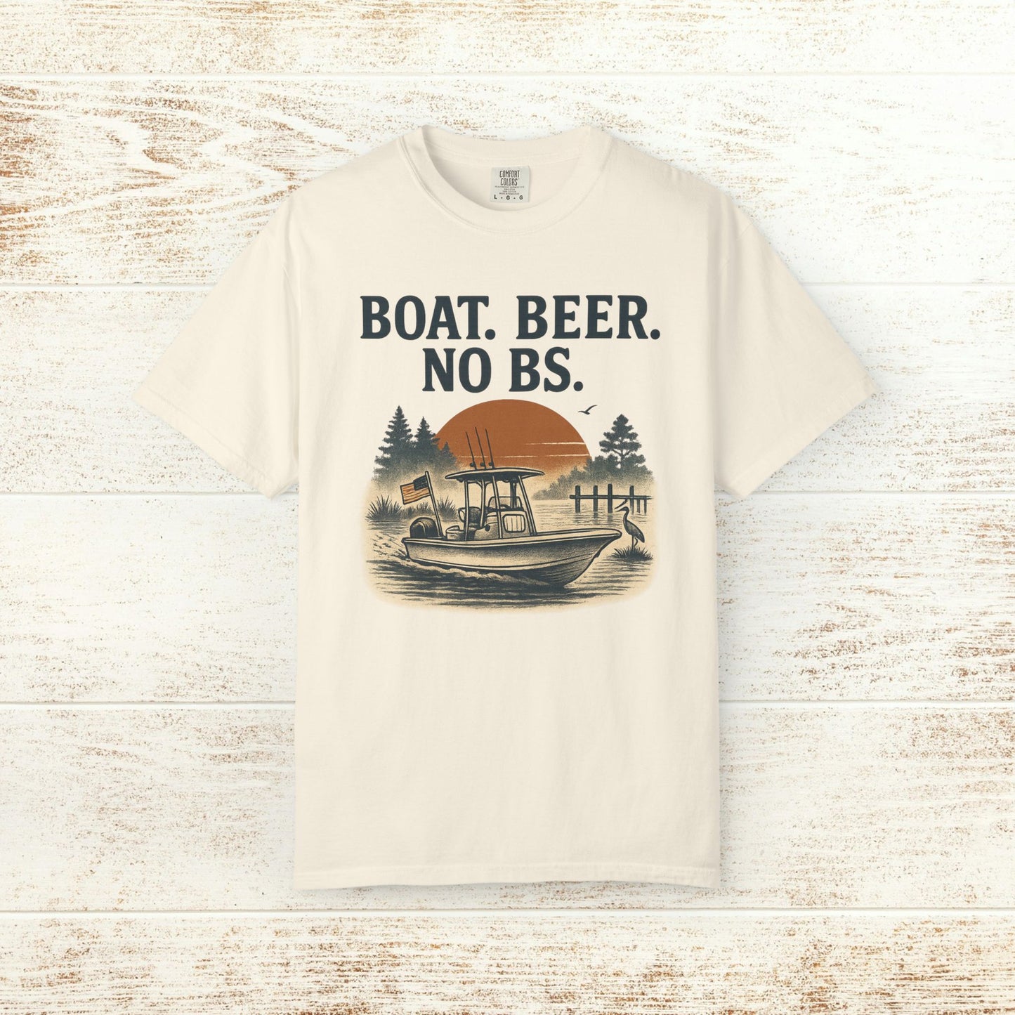 Boat Beer No BS Tee in off-white, illustrated with a classic boat scene at dusk and the tagline 'BOAT. BEER. NO BS.', great for comfortable everyday style.