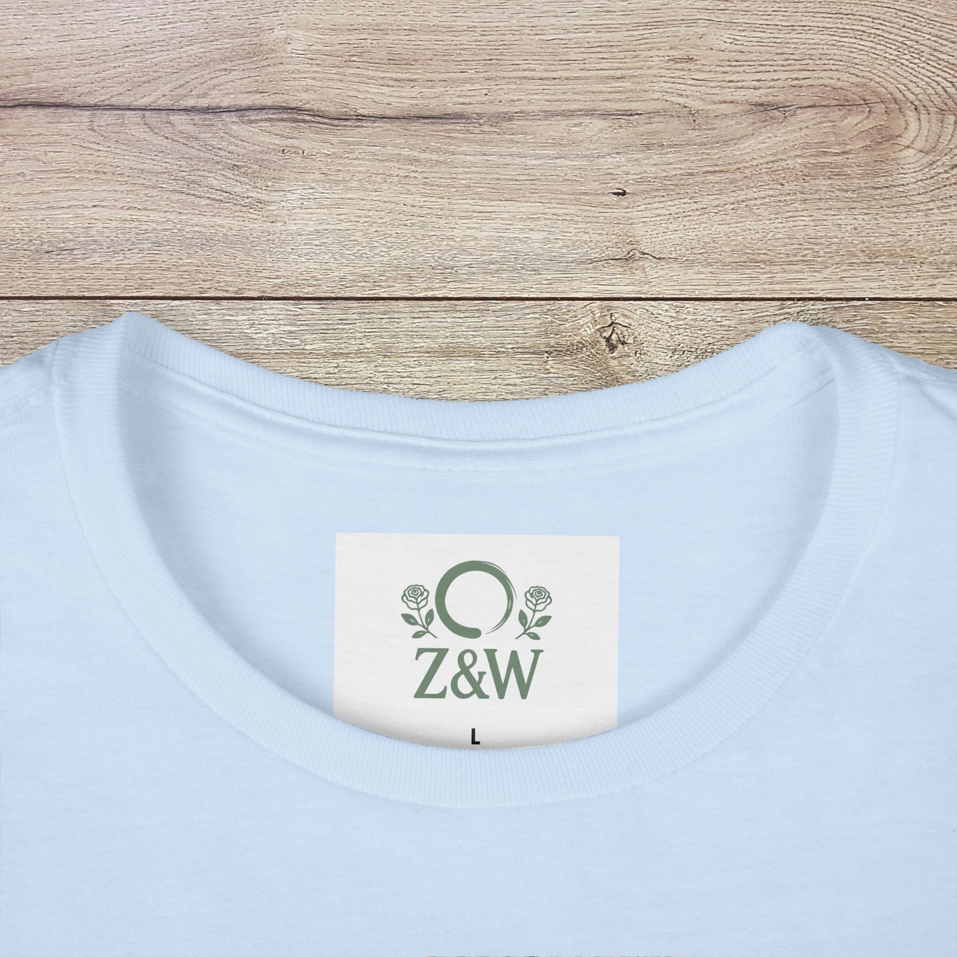 Close-up of the collar label of Sippin' Through The Seasons Slim Fit Tee, featuring the brand logo on a light-colored shirt.