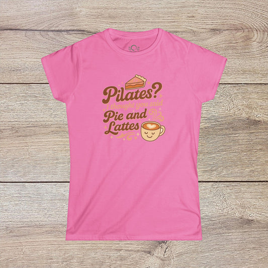 Funny Pilates T-Shirt with Durable Shoulder Tape featuring whimsical text 'Pilates? I thought you said Pie and Lattes' on a pink background. Perfect for everyday comfort.