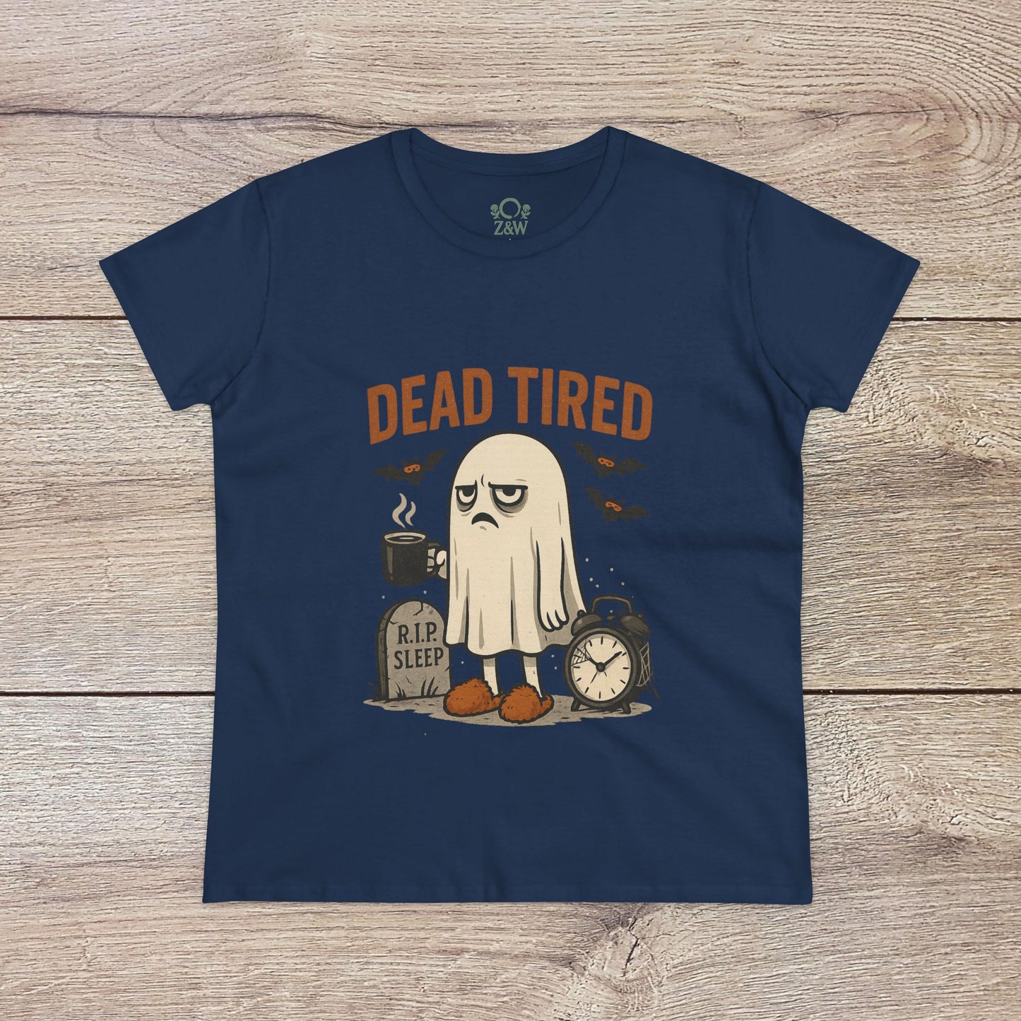 Cute Whimsical Ghost T-Shirt for Halloween in navy blue, showcasing a fun 'DEAD TIRED' design with a ghost and alarm clock, crafted from soft 100% cotton, ideal for casual wear.