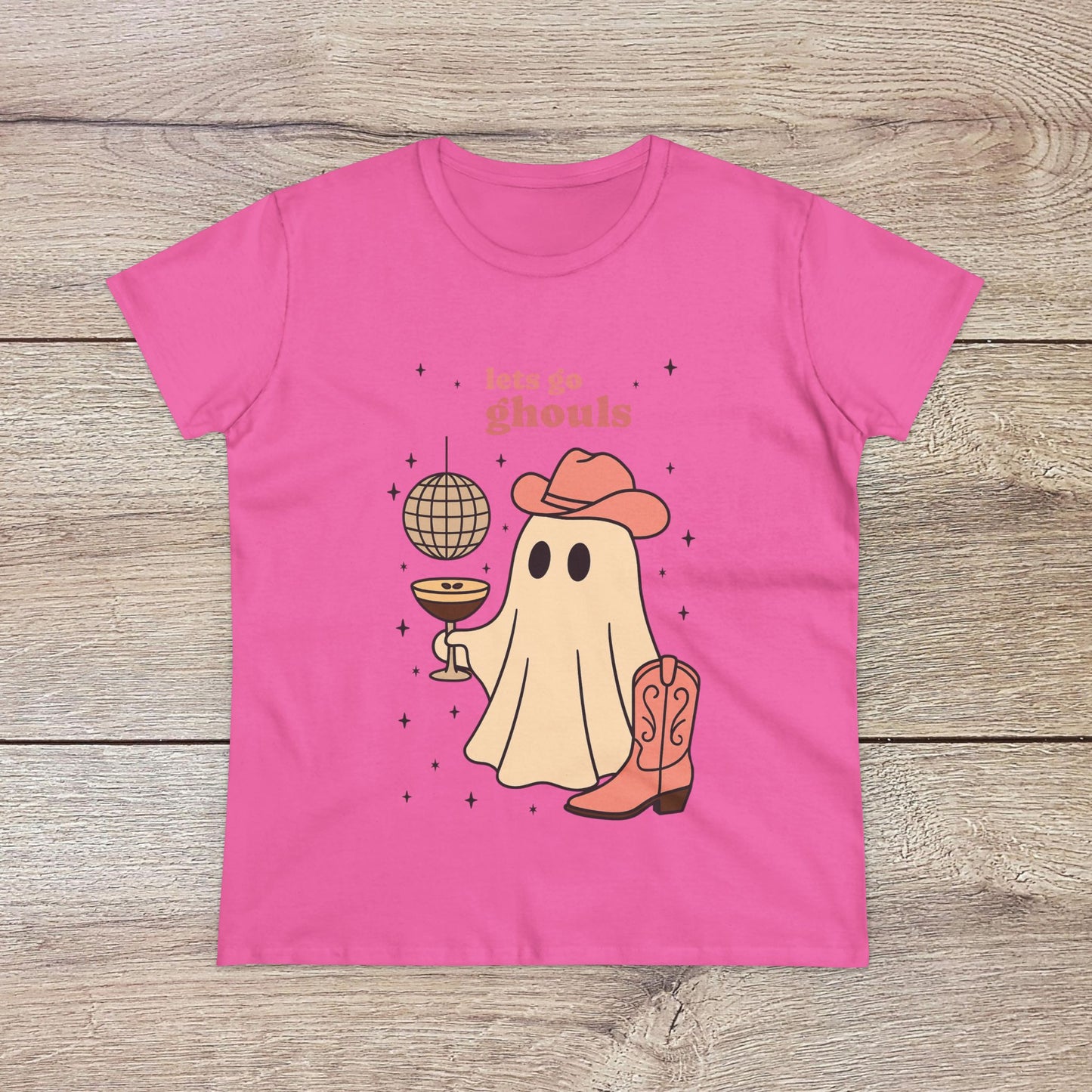 Let's Go Ghouls Tee in playful pink, featuring a charming ghost in cowboy attire, perfect for Halloween celebrations. Made from soft, high-quality cotton.