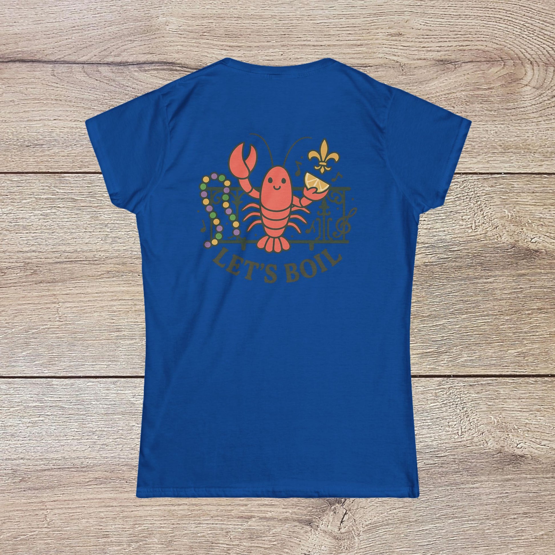 Crawfish Boil Shirt for Women in vibrant blue, showcasing a fun lobster graphic with the text 'LET'S BOIL', ideal for seafood lovers attending summer festivals and NOLA celebrations.