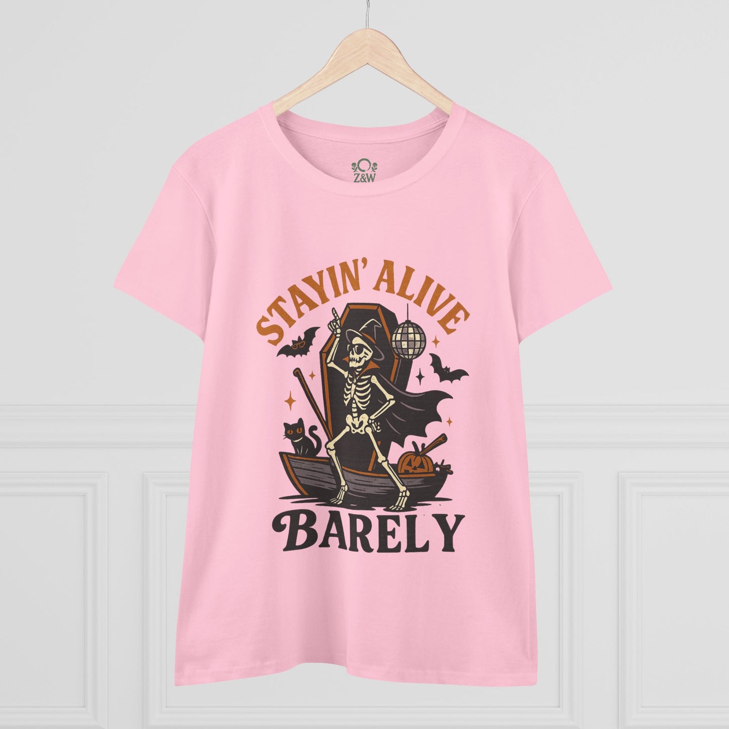 Front view of Stayin’ Alive T-Shirt in pink showcasing a fun skeleton design, perfect for Halloween festivities.