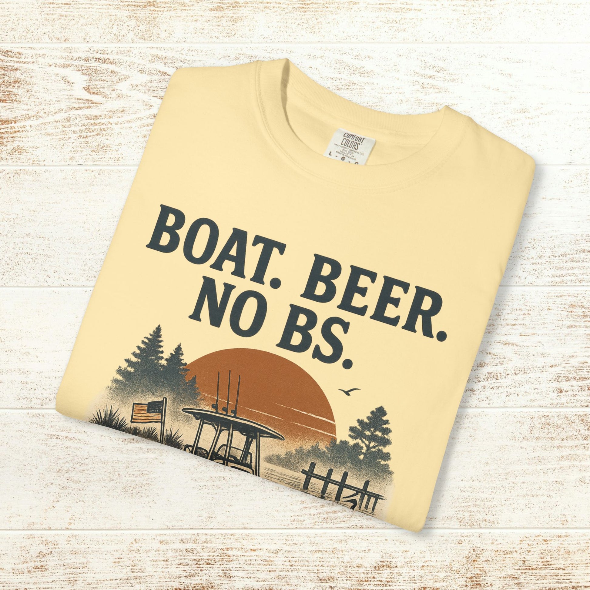 Boat Beer No BS Tee presented flat in a light yellow color, featuring a striking sunset and fishing scene on the fabric.