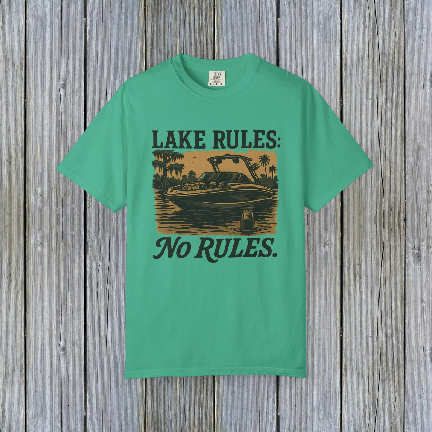 Unisex Garment-Dyed Lake Rules Tee in vibrant teal, highlighting a scenic lake view with 'Lake Rules: No Rules.' text, crafted from soft vintage fabric for outdoor enjoyment.
