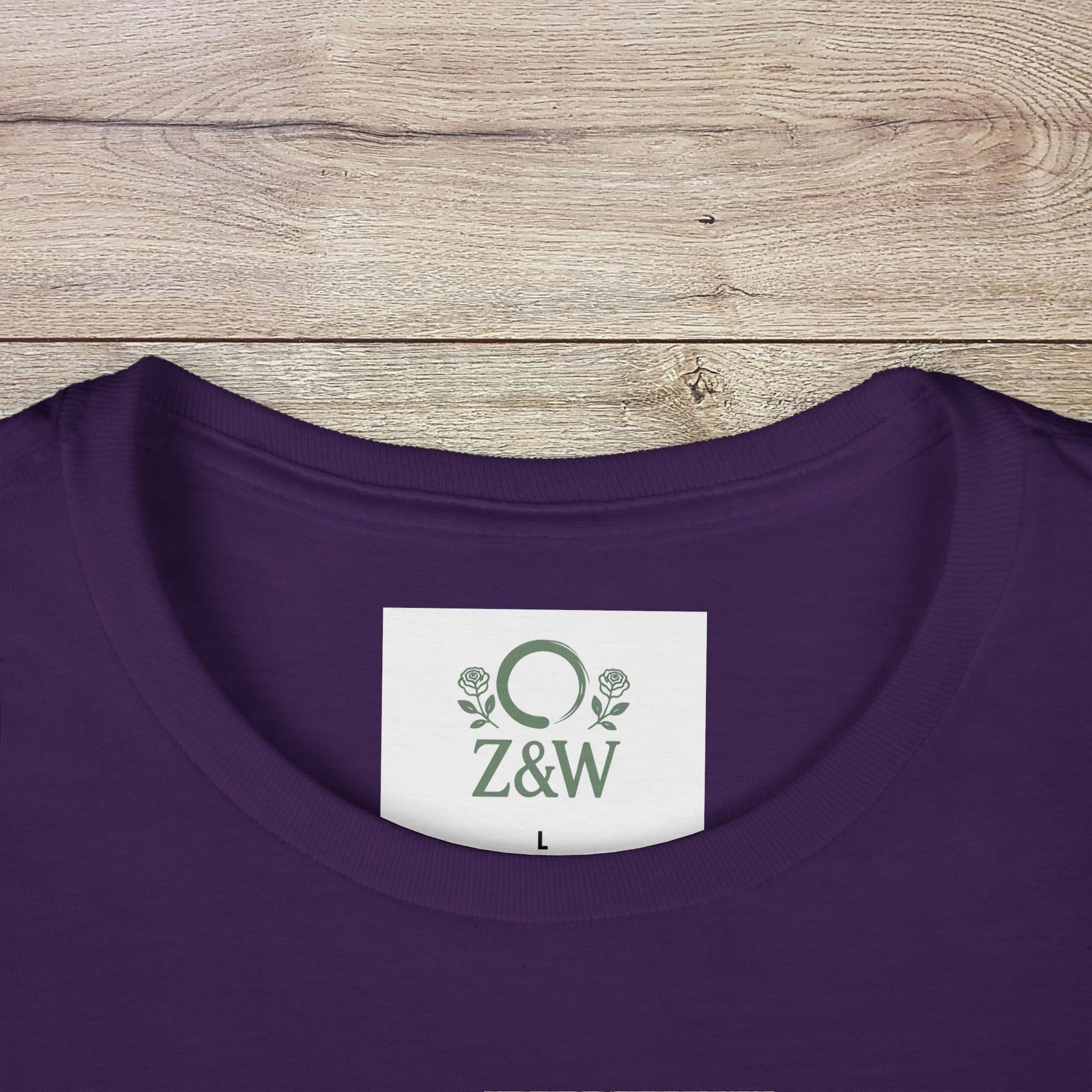 Close-up of the collar label of Sippin' Through The Seasons Slim Fit Tee in purple color, featuring the brand Z&W and size L, made with 100% combed cotton for ultimate comfort.