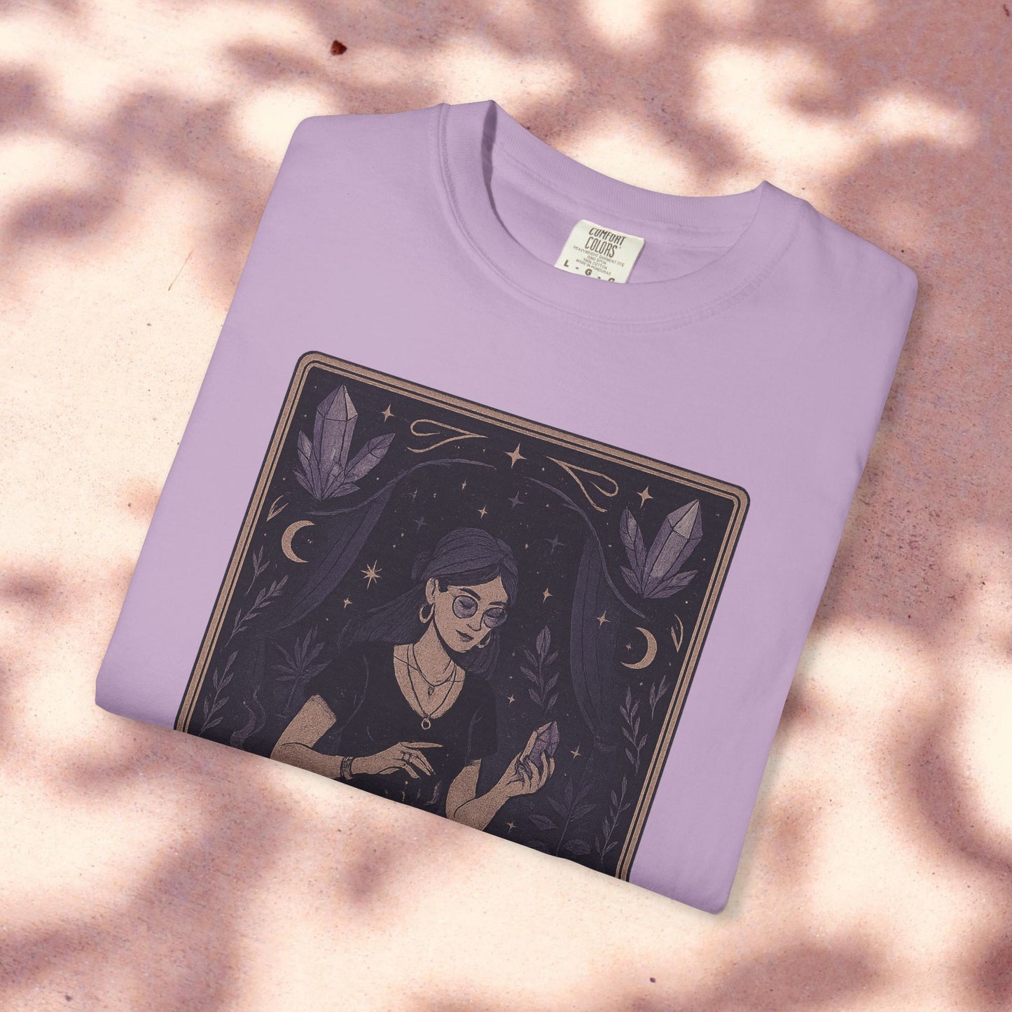 Lavender Intuitive Tarot Tee presenting a whimsical illustration of a tarot reader, available in sizes S-4XL, made of premium cotton.