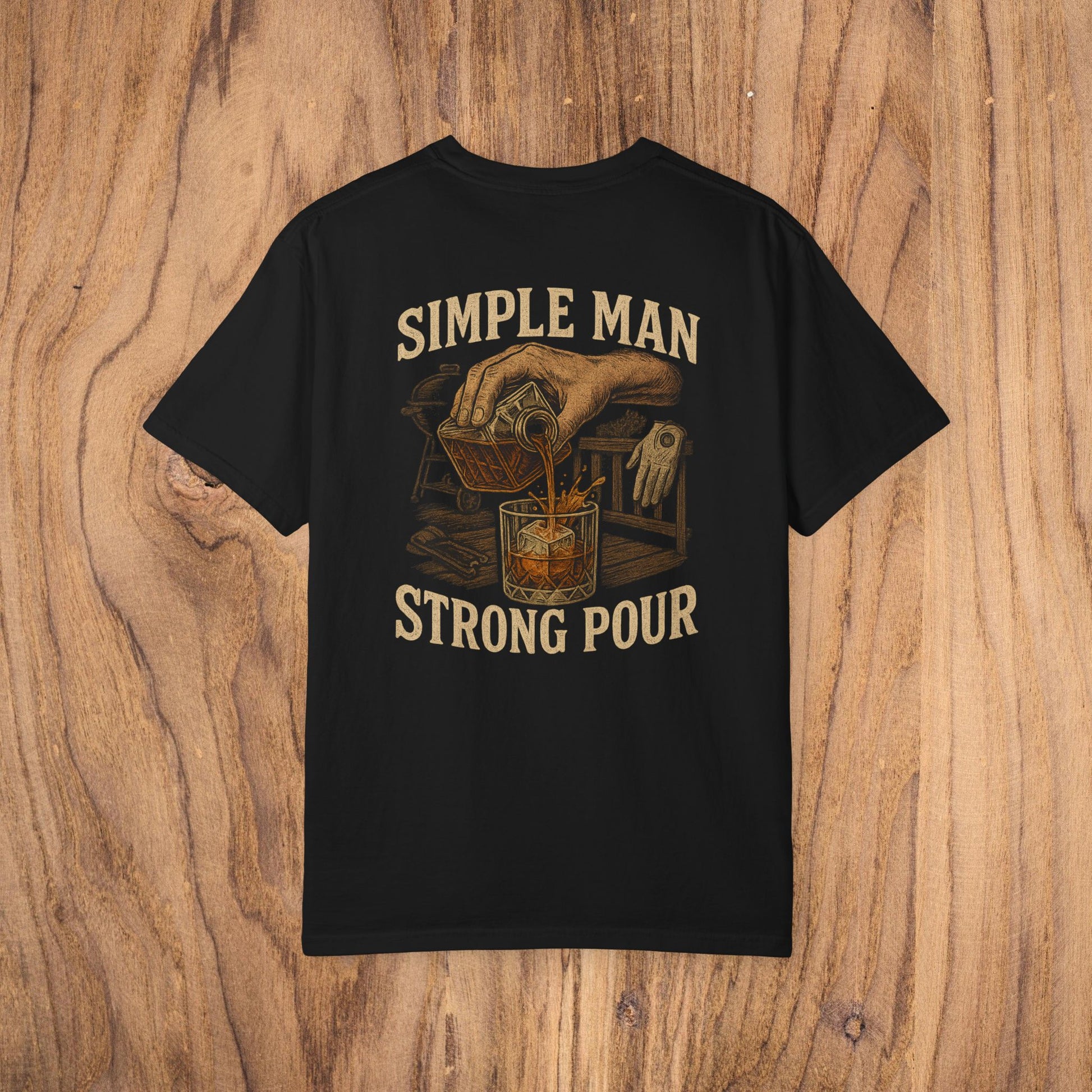 Simple Man Strong Pour T-Shirt in black showcasing an artistic design of a hand pouring a beverage, crafted from soft, ethically sourced 100% cotton.