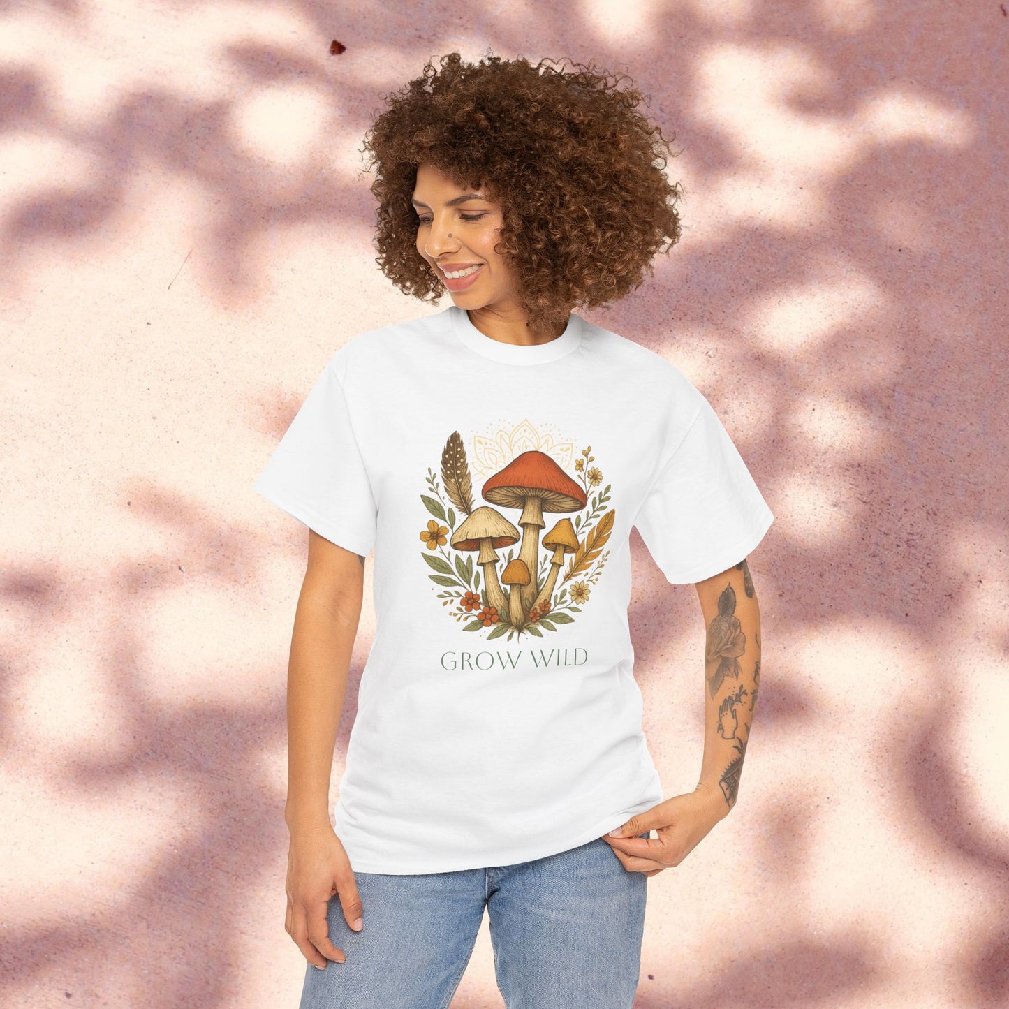 Wild Mushroom Graphic Tee in White - Eco-Friendly Unisex Cotton Shirt for Nature Lovers, Adventure Apparel displayed on a model, highlighting the whimsical mushroom design and 'GROW WILD' phrase.