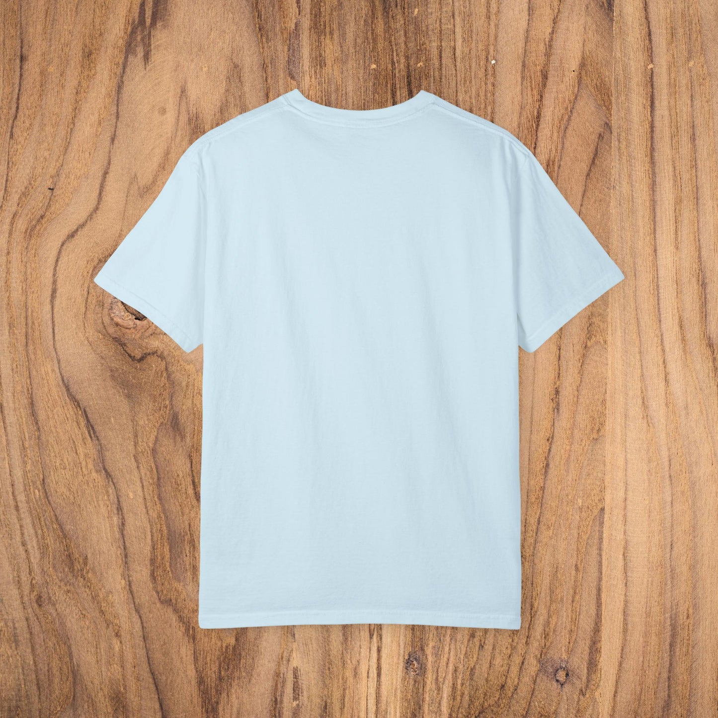 Unisex Sunset Palm Tree T-Shirt - Vibrant Garment-Dyed Cotton Tee for Men & Women in Light Blue highlighting the rear design of a classic t-shirt.