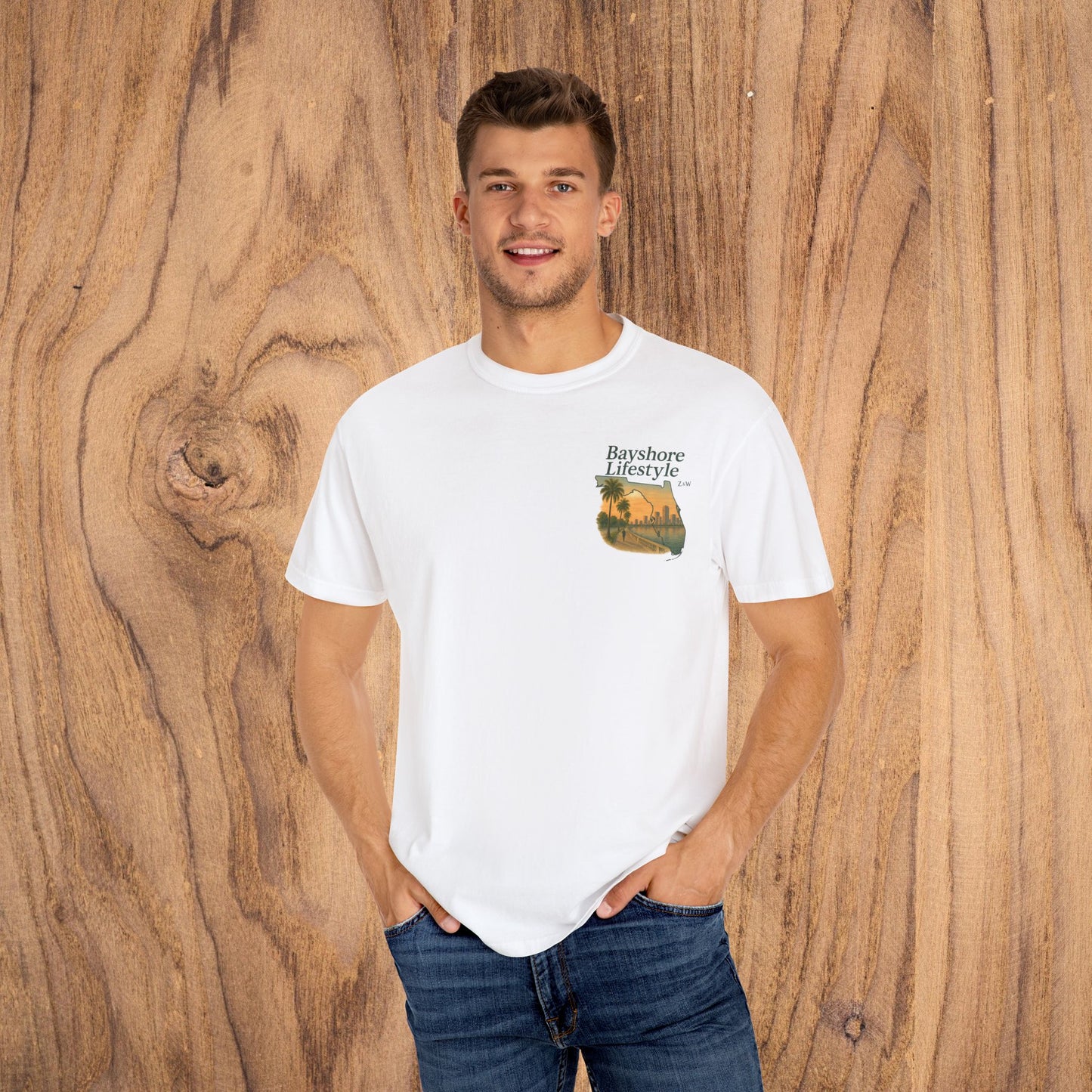 Bayshore Lifestyle Tee - Model wearing a white 100% cotton t-shirt with a graphic design, demonstrating casual style and fit.