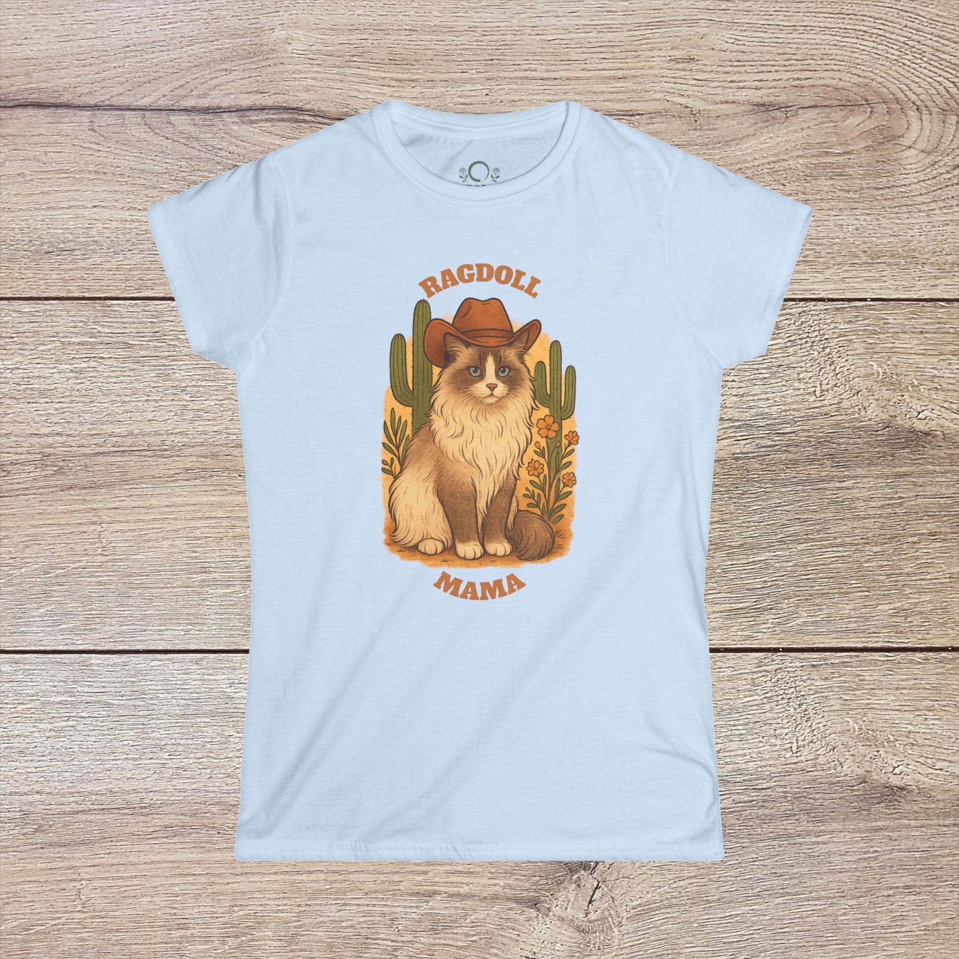 Ragdoll Mama T-Shirt in light blue featuring a delightful Ragdoll cat dressed in a cowboy hat, perfect for fans of cat-themed apparel.