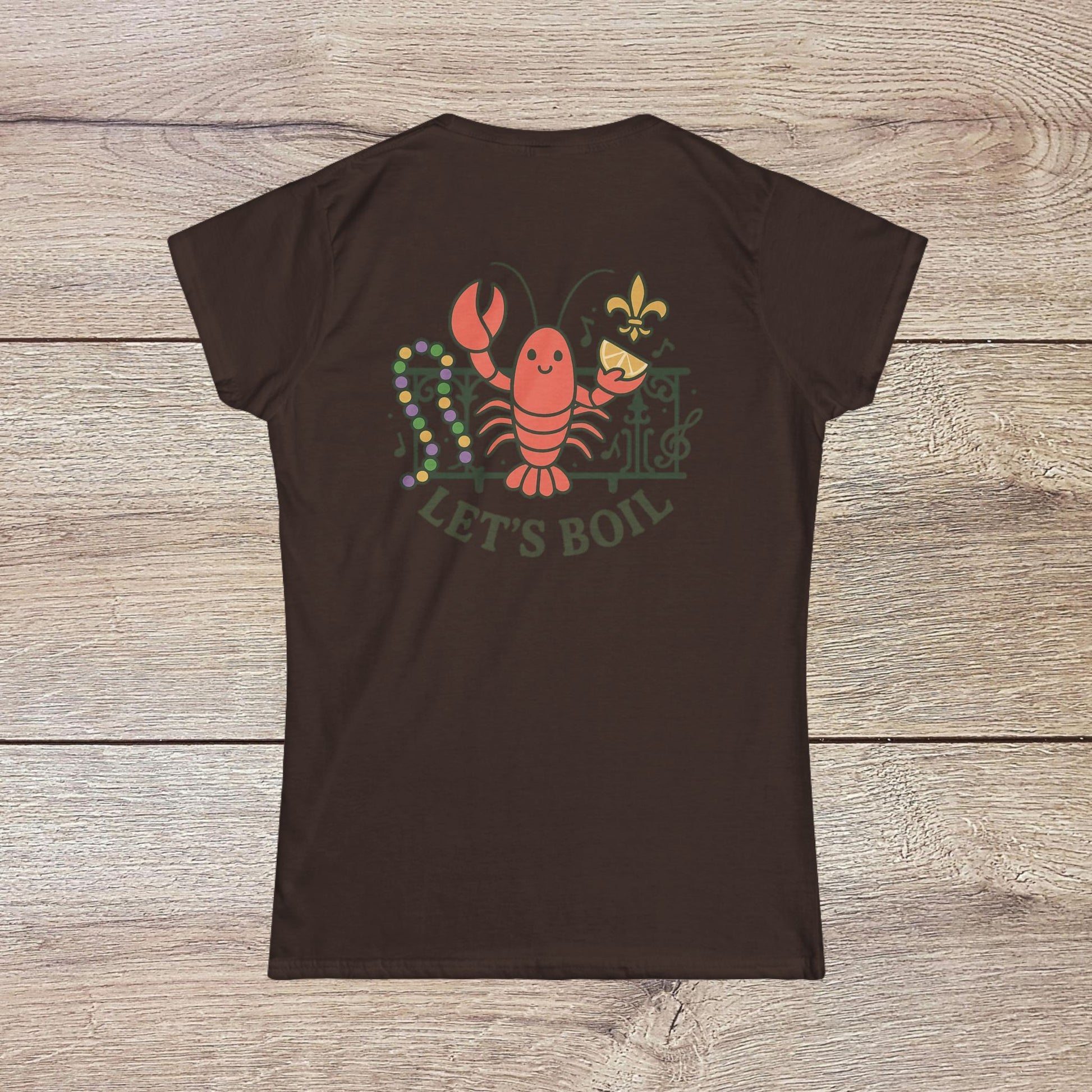 Crawfish Boil Shirt for Women in rich brown, featuring an eye-catching lobster graphic and 'LET'S BOIL' text, tailored for summer festivals and joyful celebrations.